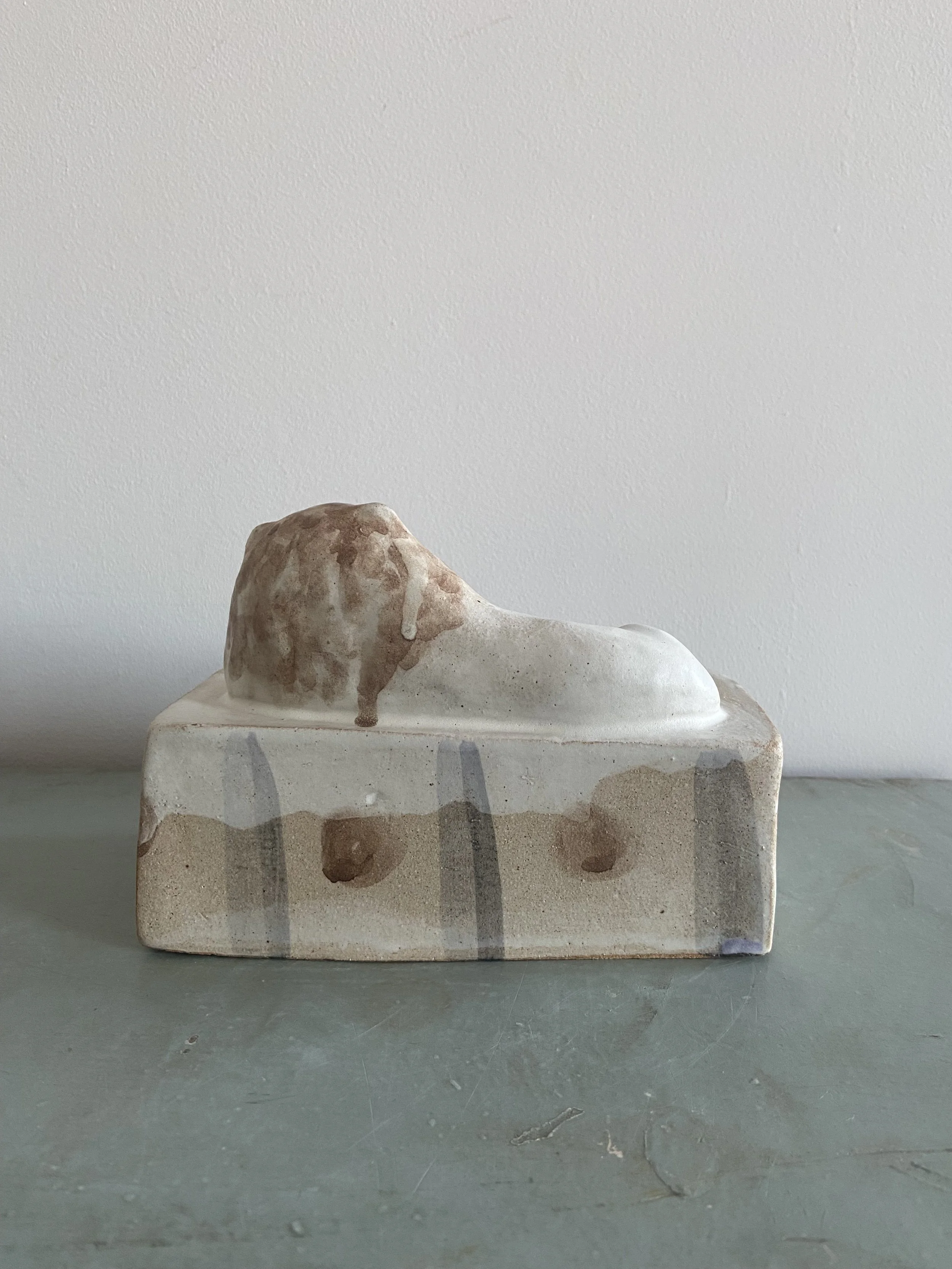 Handmade ceramic lions by Charlotte Salt