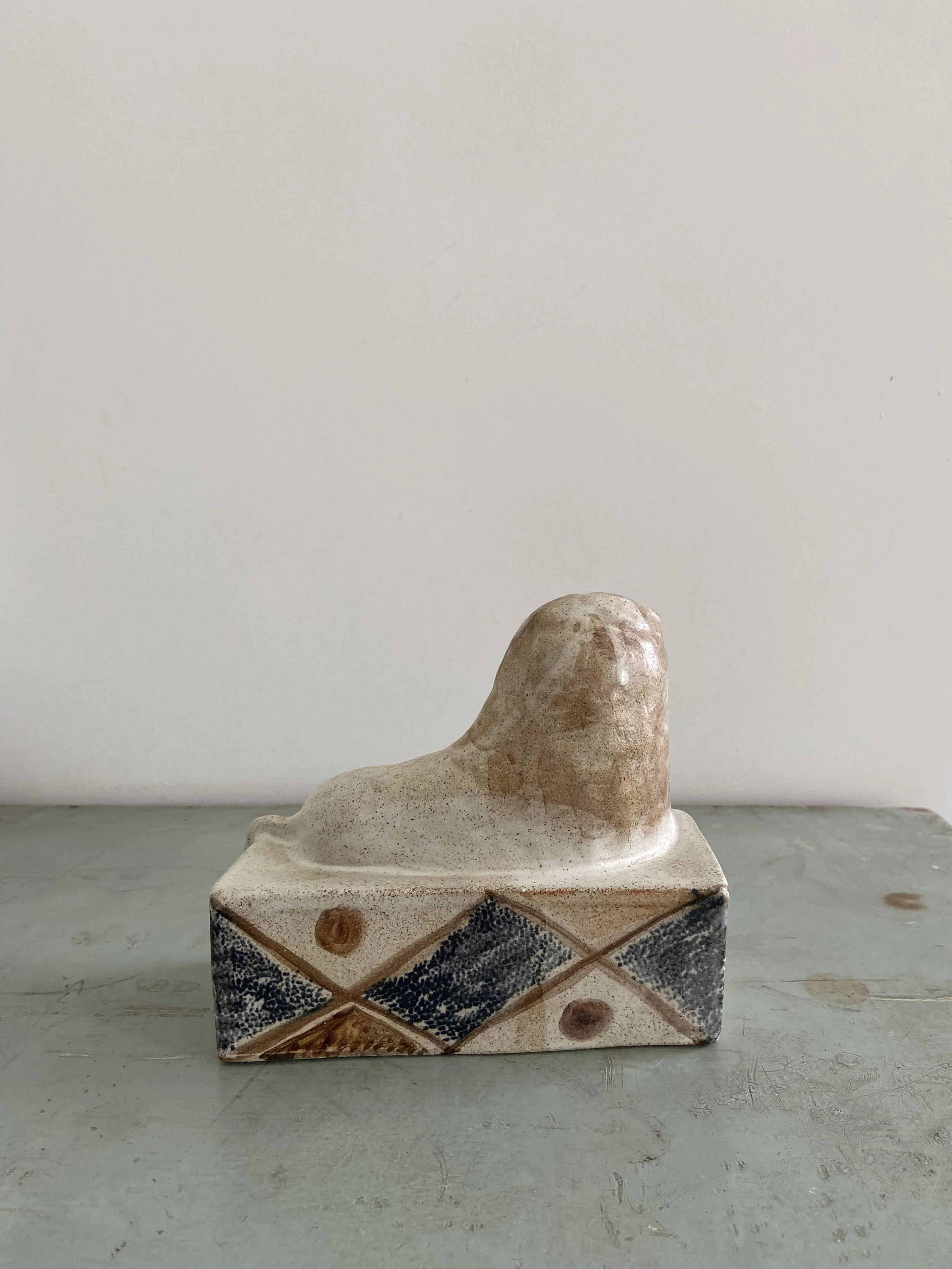 Handmade stoneware lions by Charlotte salt
