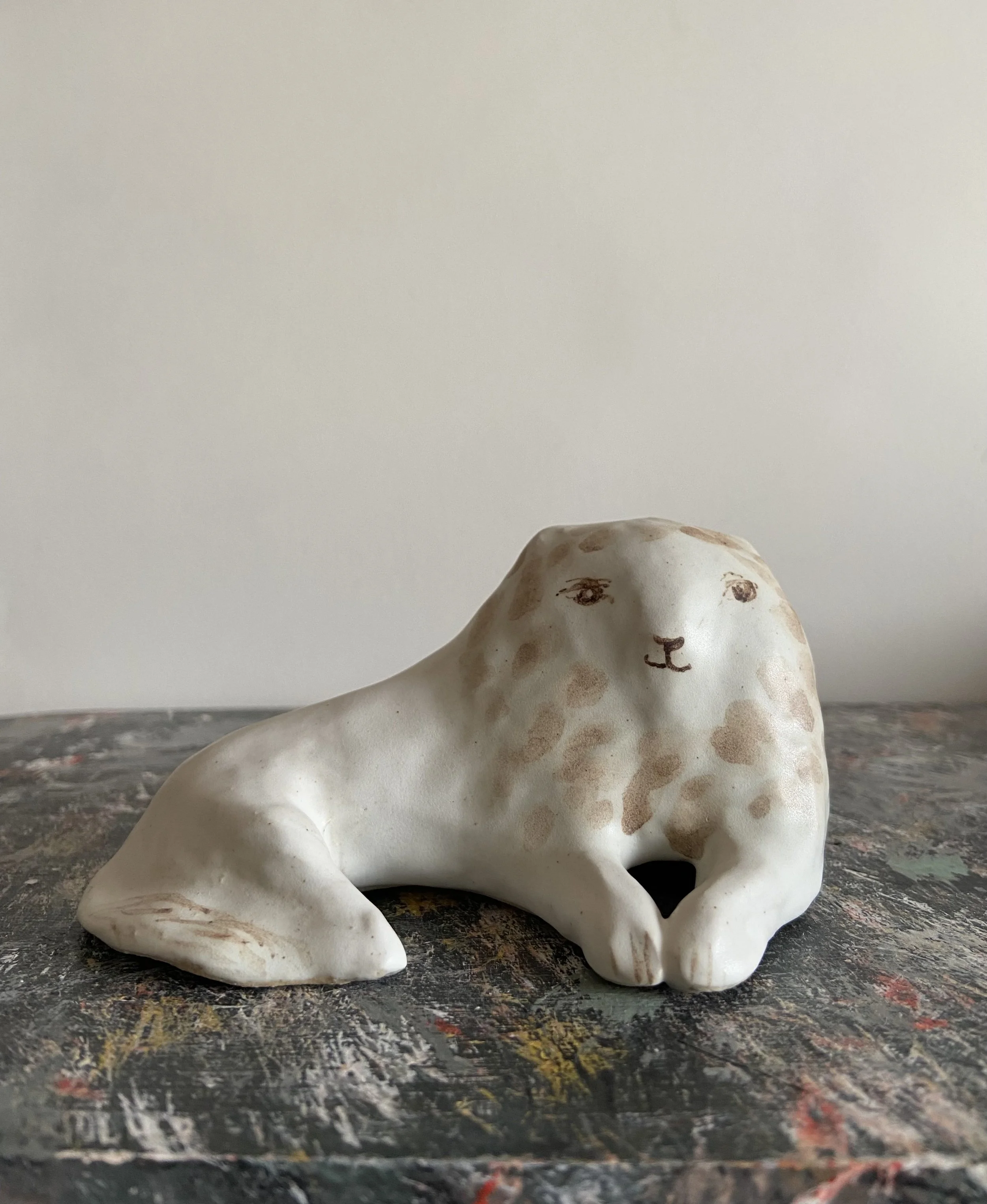 Handmade stoneware lions by Charlotte Salt