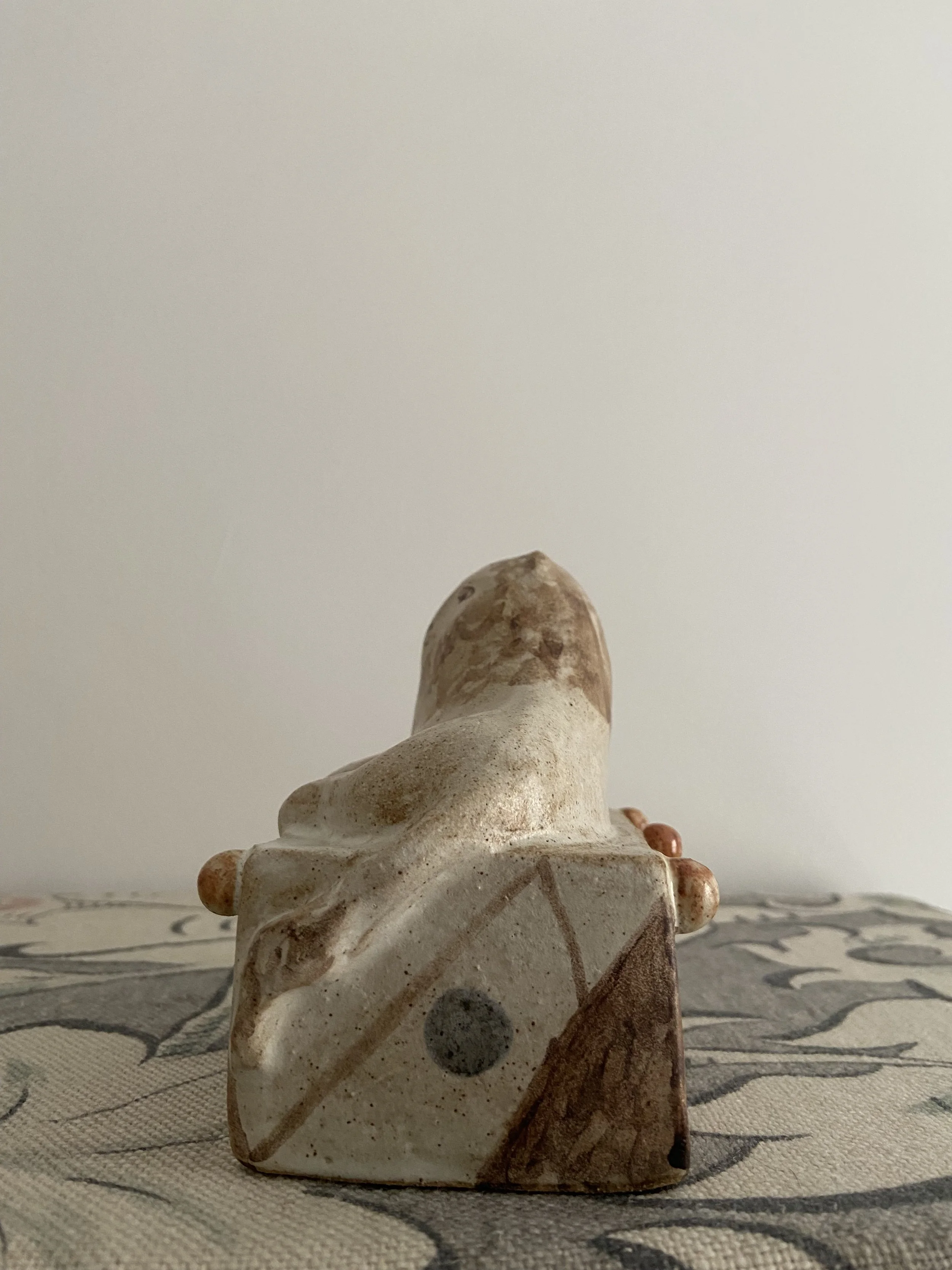 Stoneware lions by Charlotte Salt