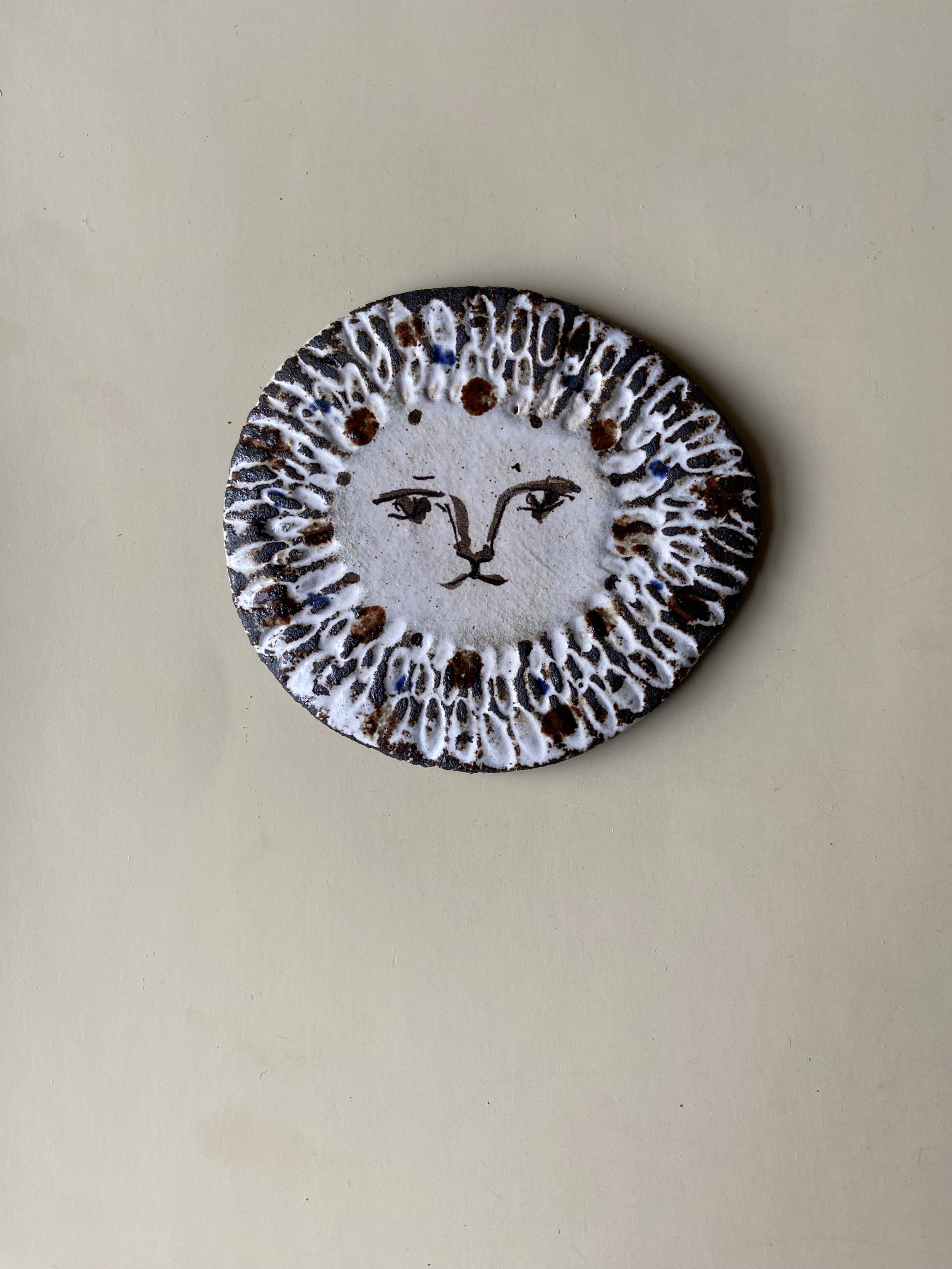 handmade lion tile by Charlotte Salt
