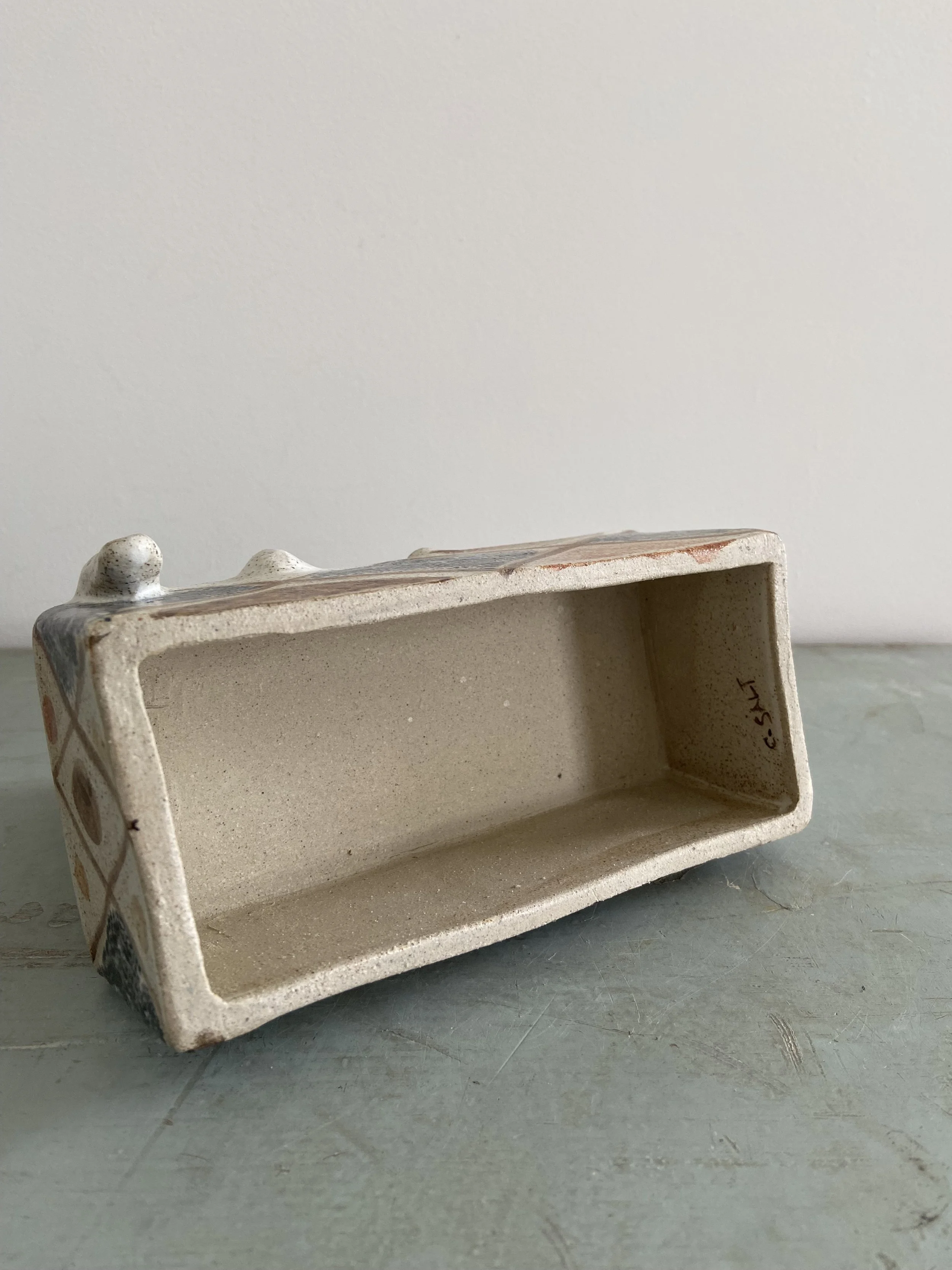 Handmade stoneware lions by Charlotte salt