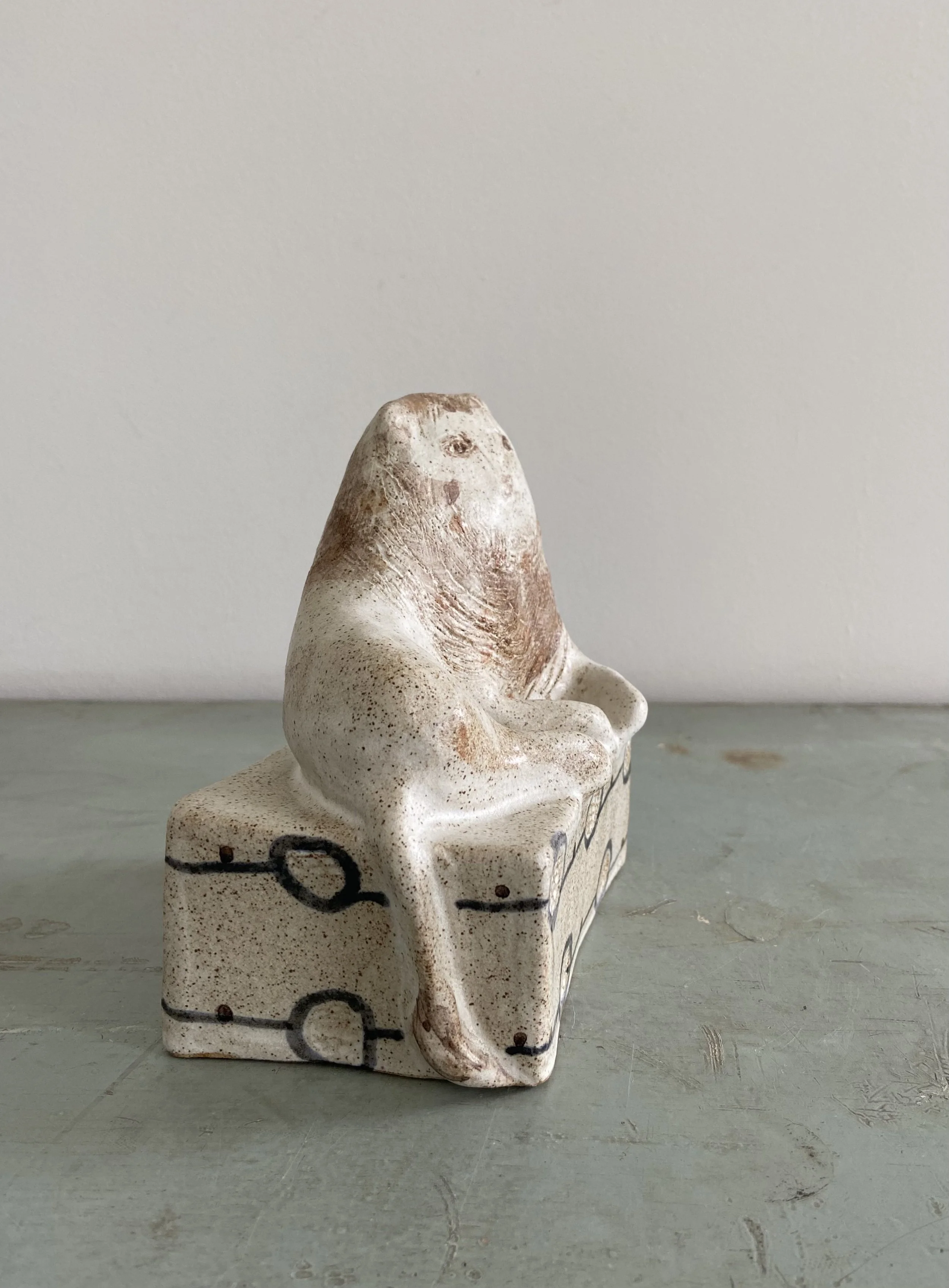 Handmade stoneware lions by Charlotte salt