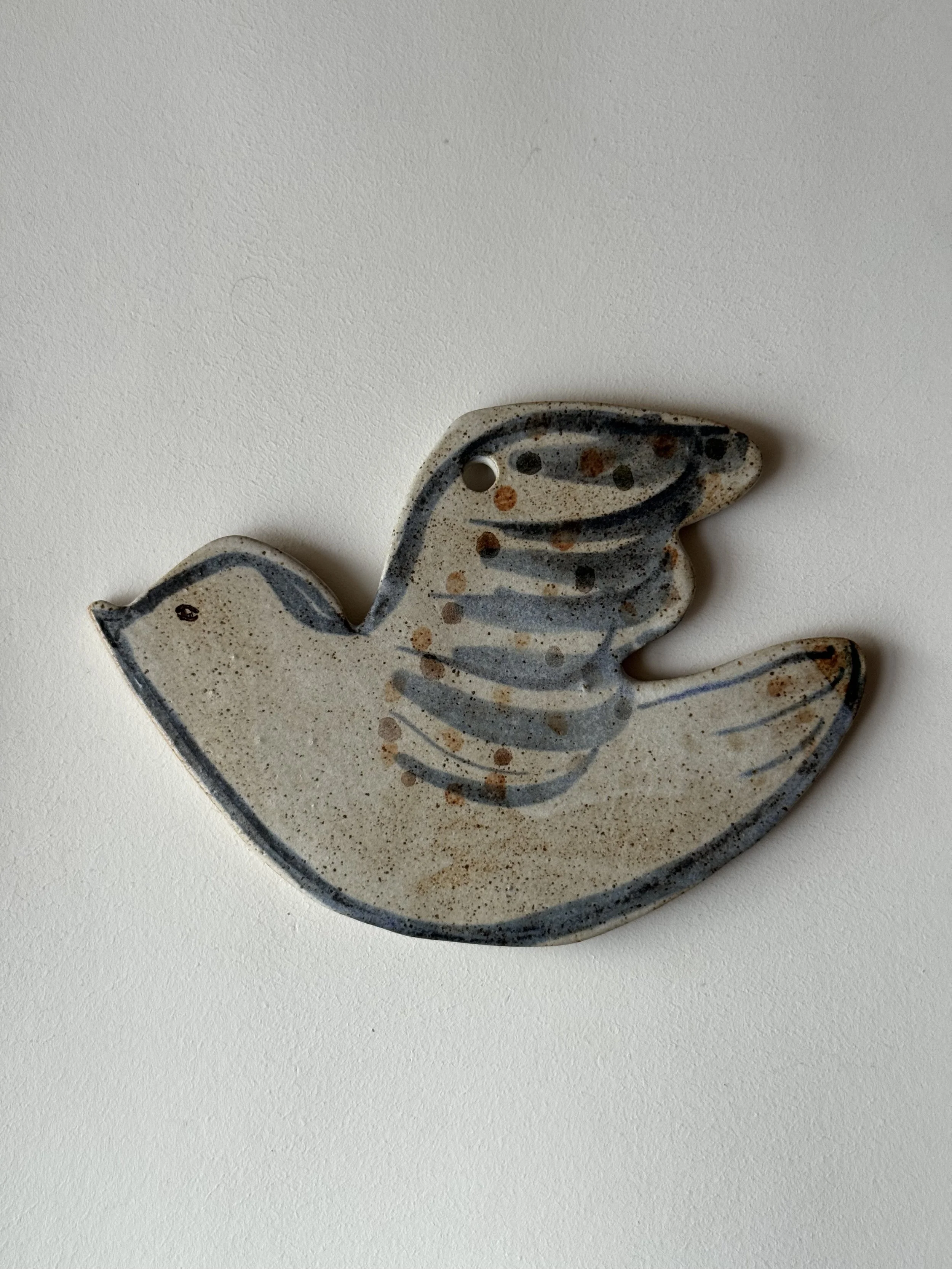 Ceramic bird decoration by Charlotte Salt