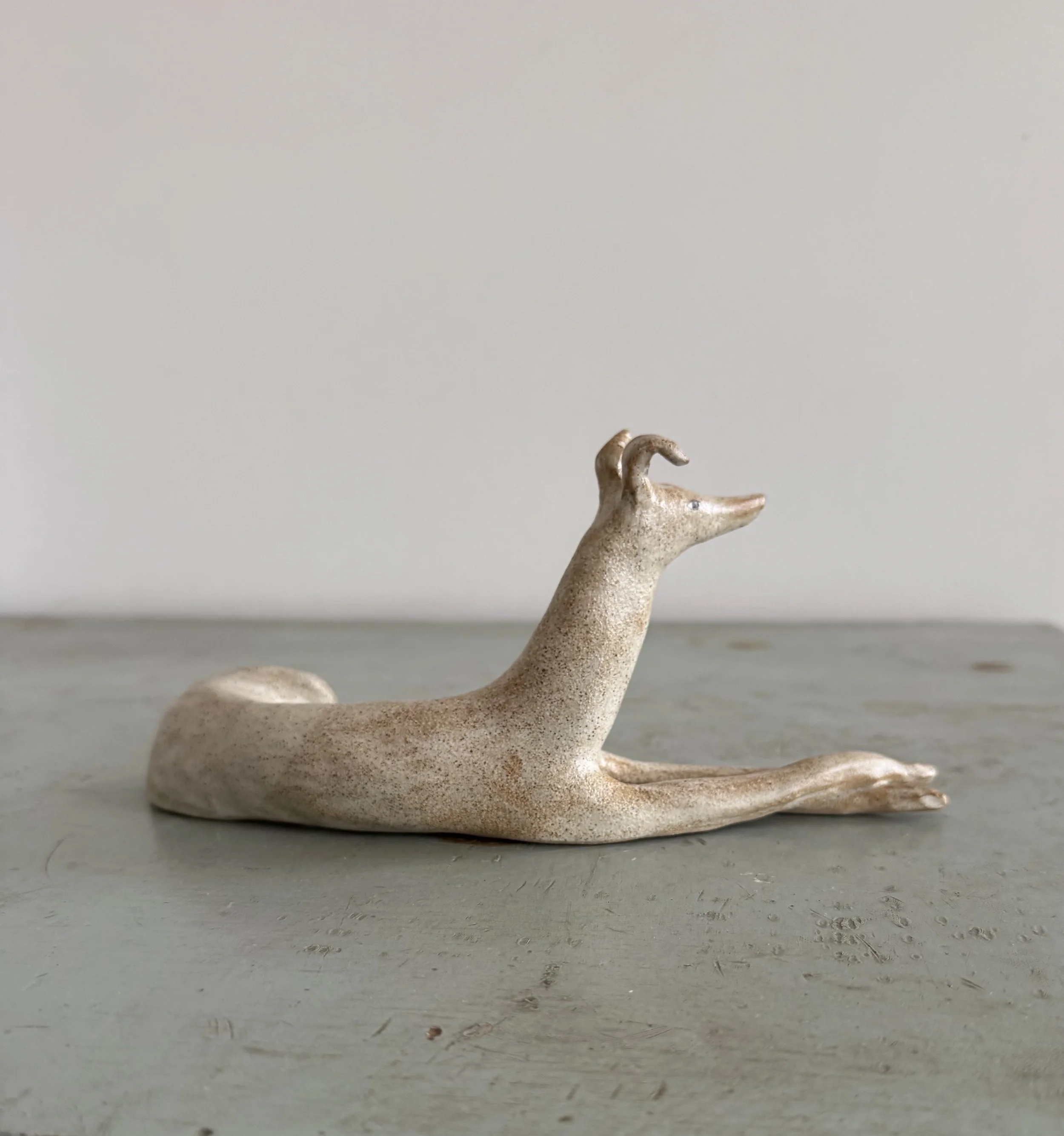 Stoneware hounds by Charlotte Salt