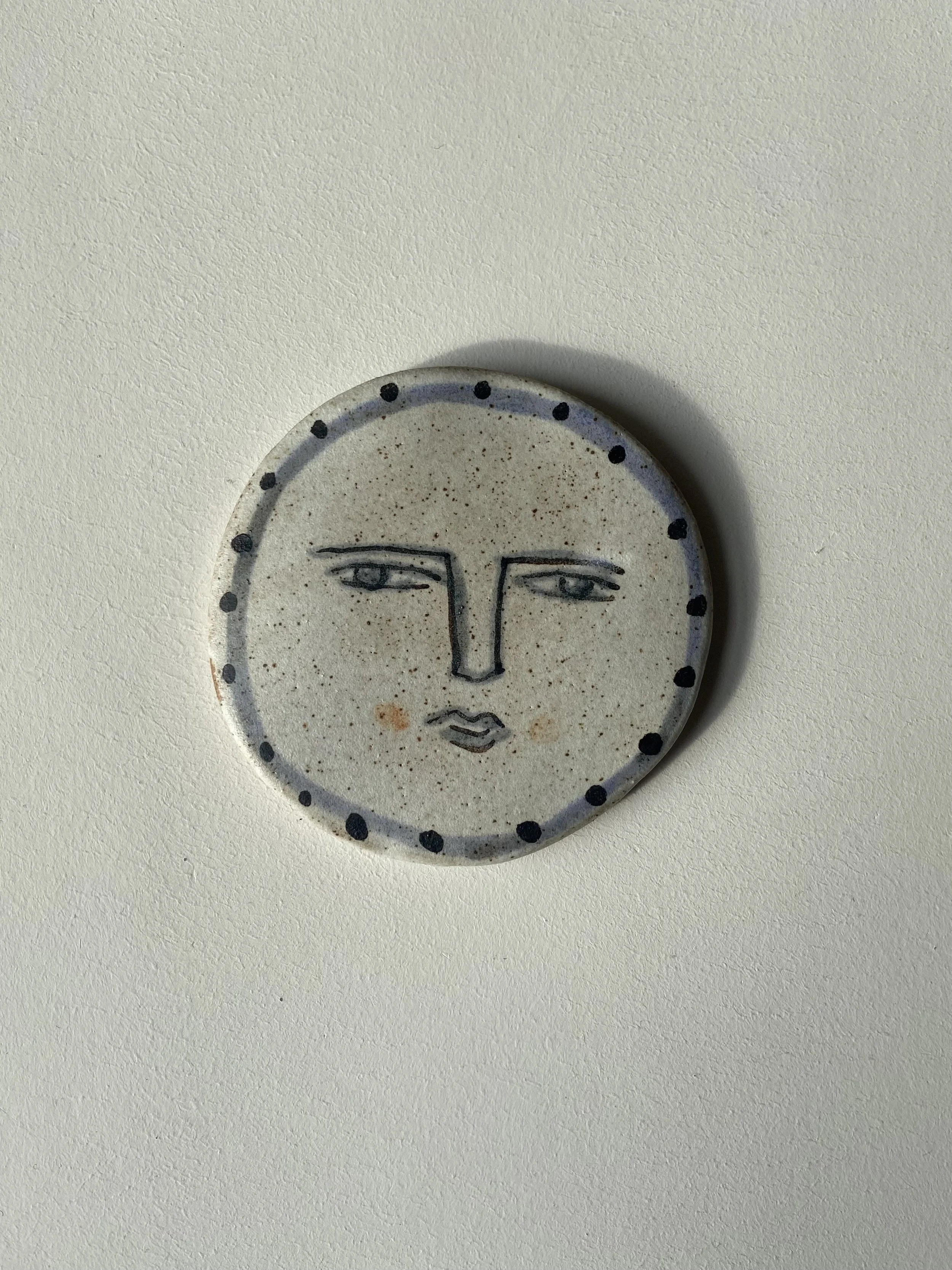 Handmade face disc by Charlotte Salt