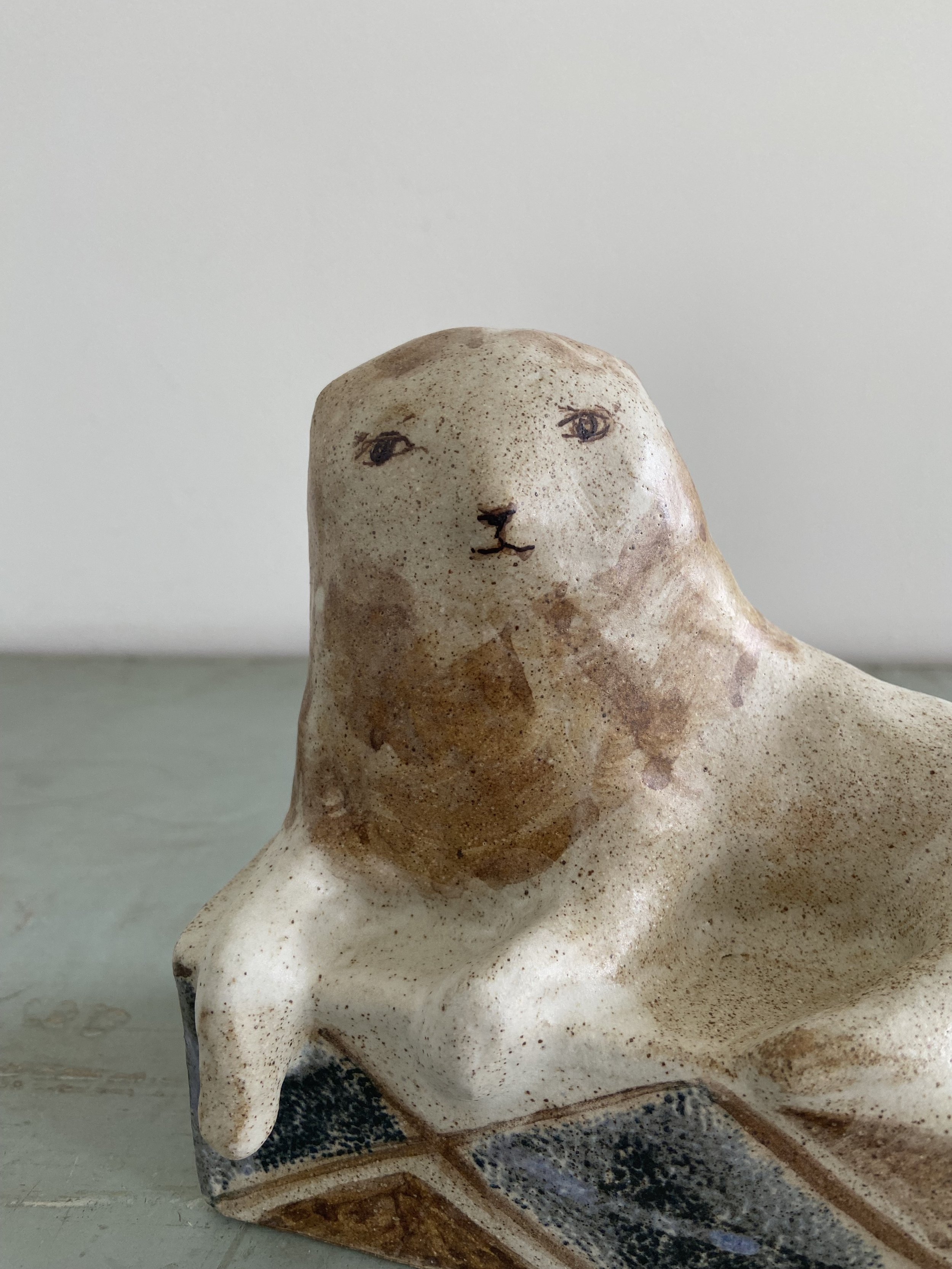 Handmade stoneware lions by Charlotte salt