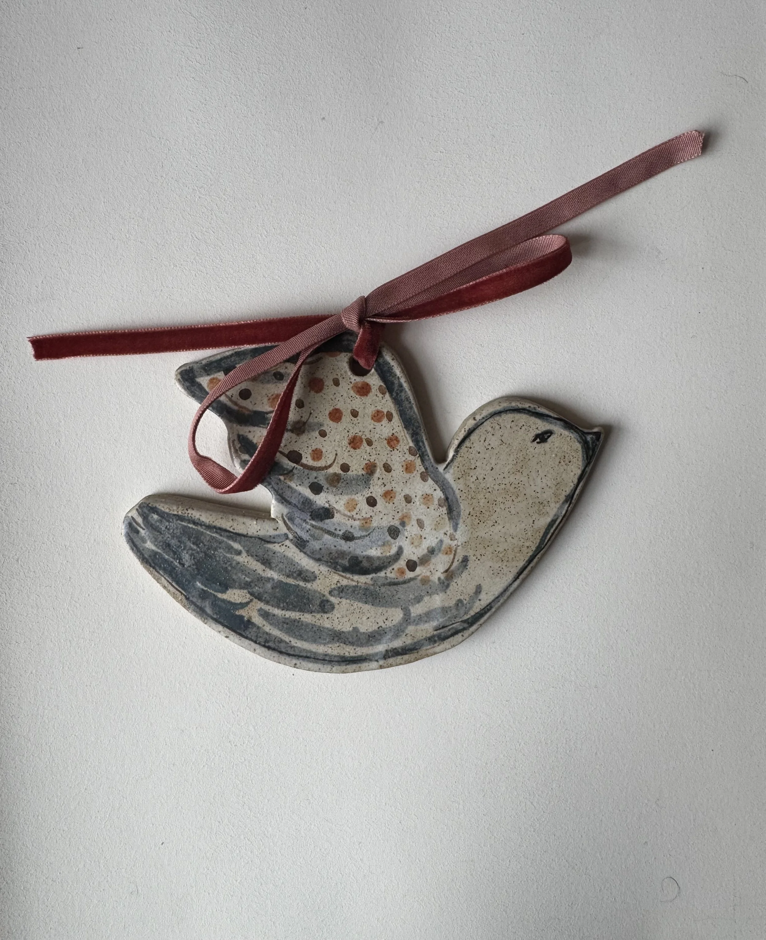 Ceramic bird decoration by Charlotte Salt
