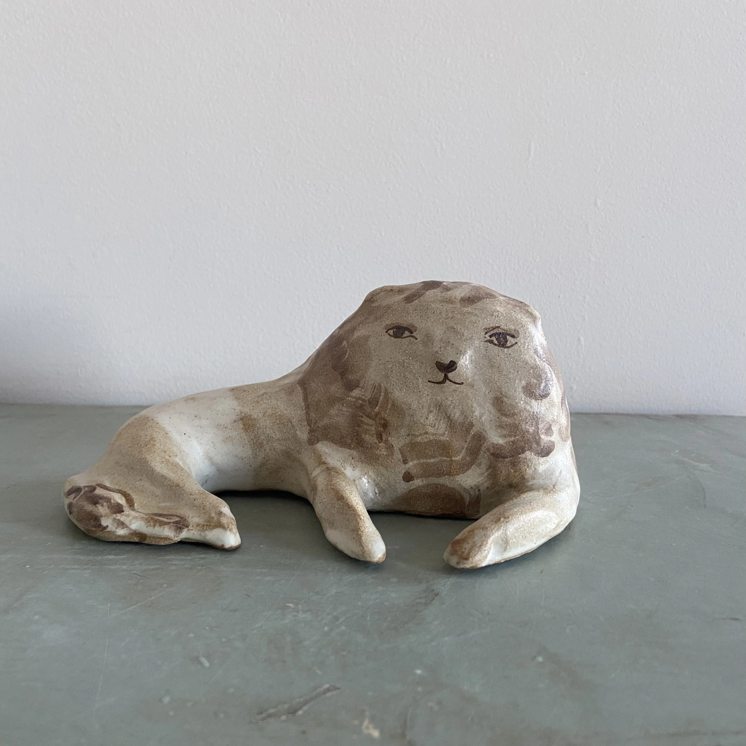 Ceramic lions by Charlotte Salt