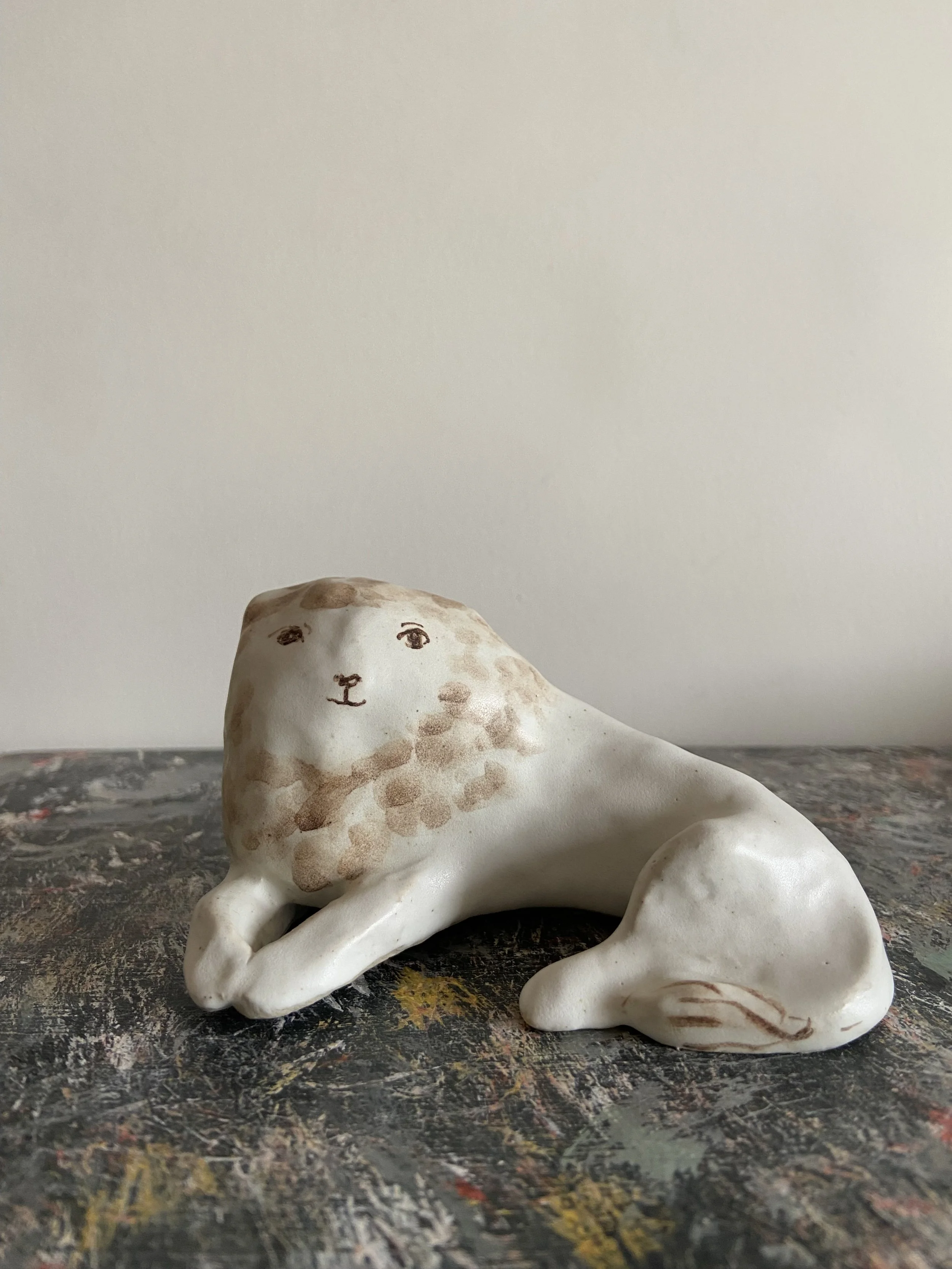 Handmade stoneware lions by Charlotte Salt