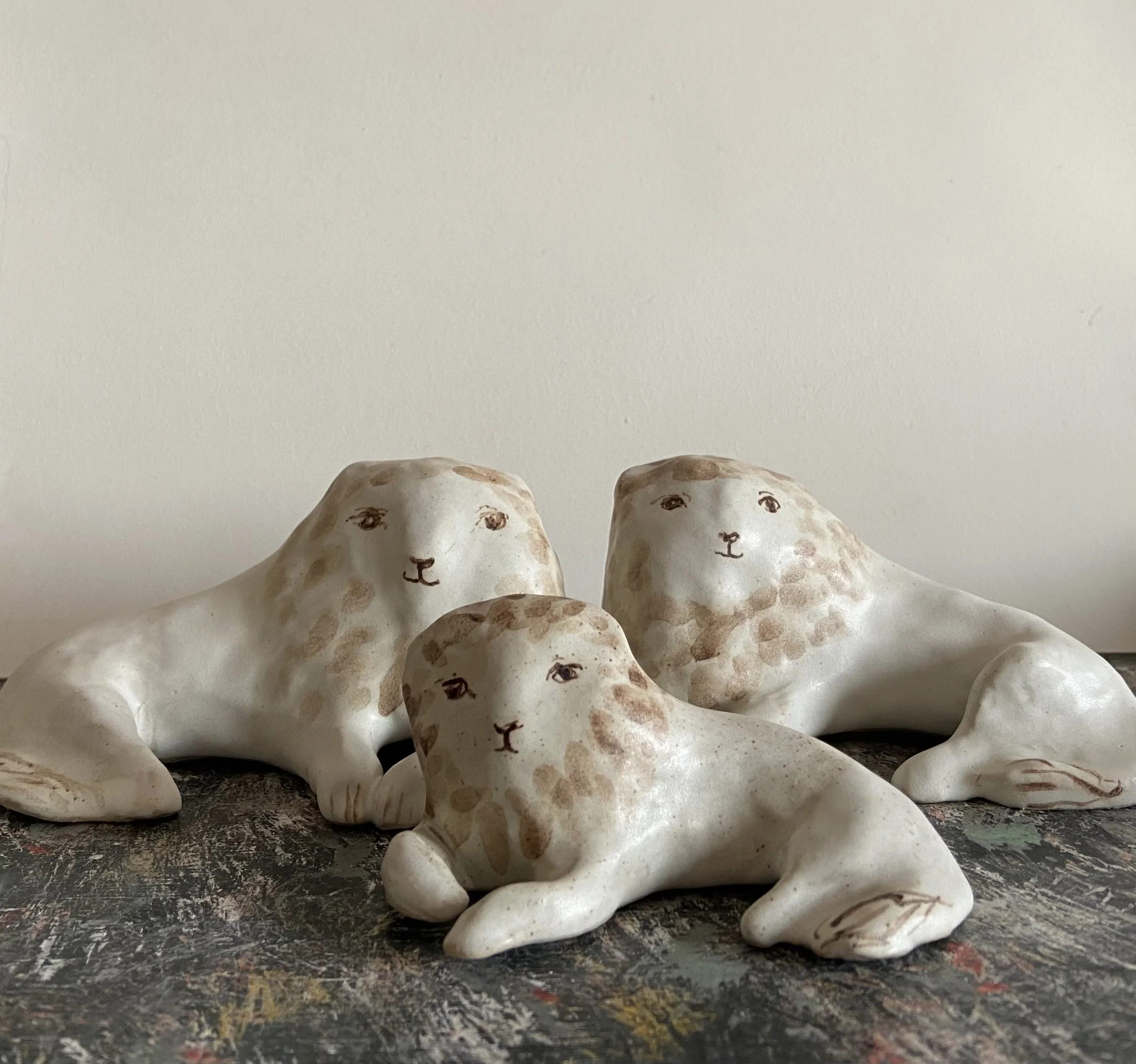 White Stoneware Lions