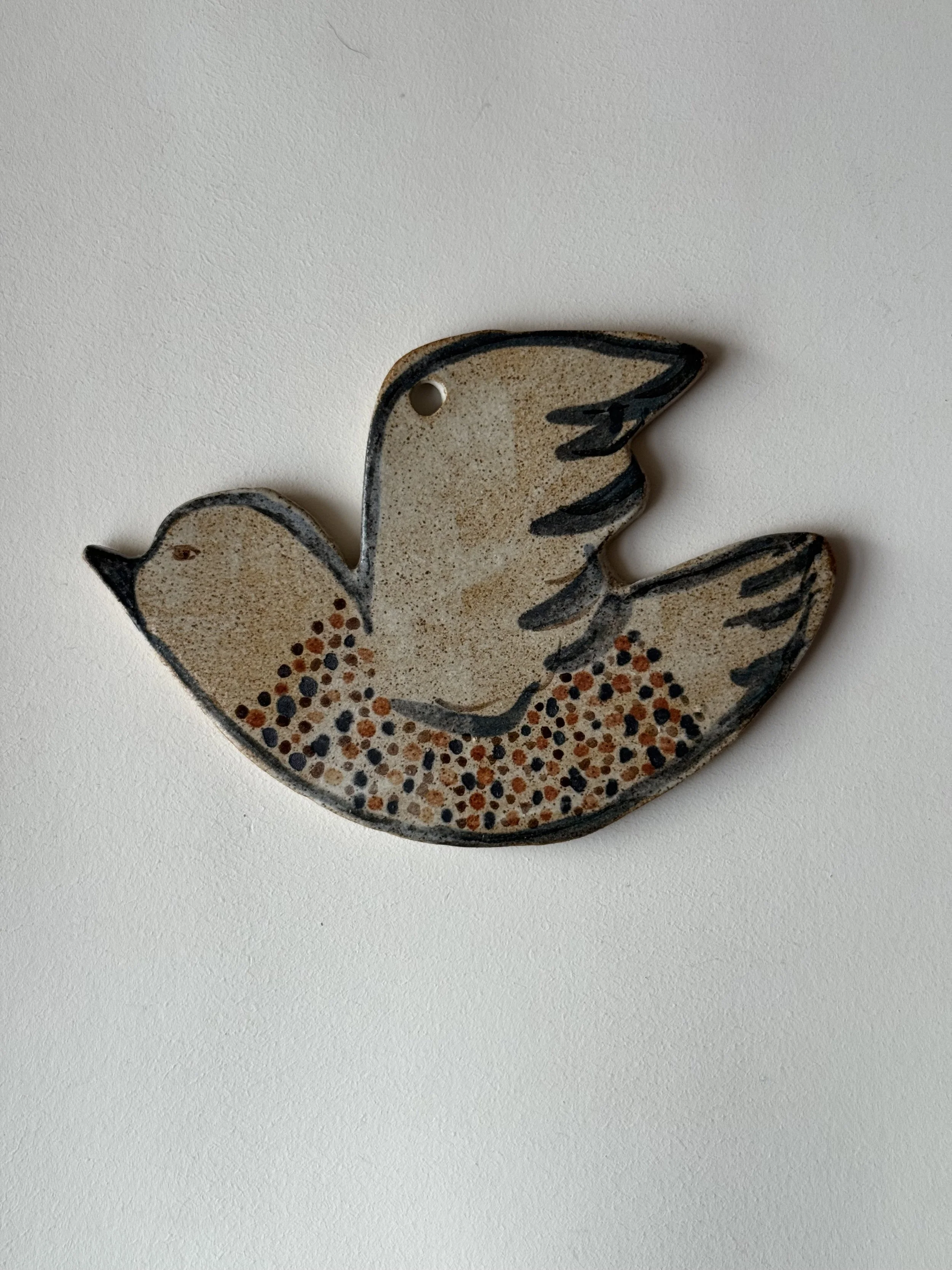 Ceramic bird decoration by Charlotte Salt