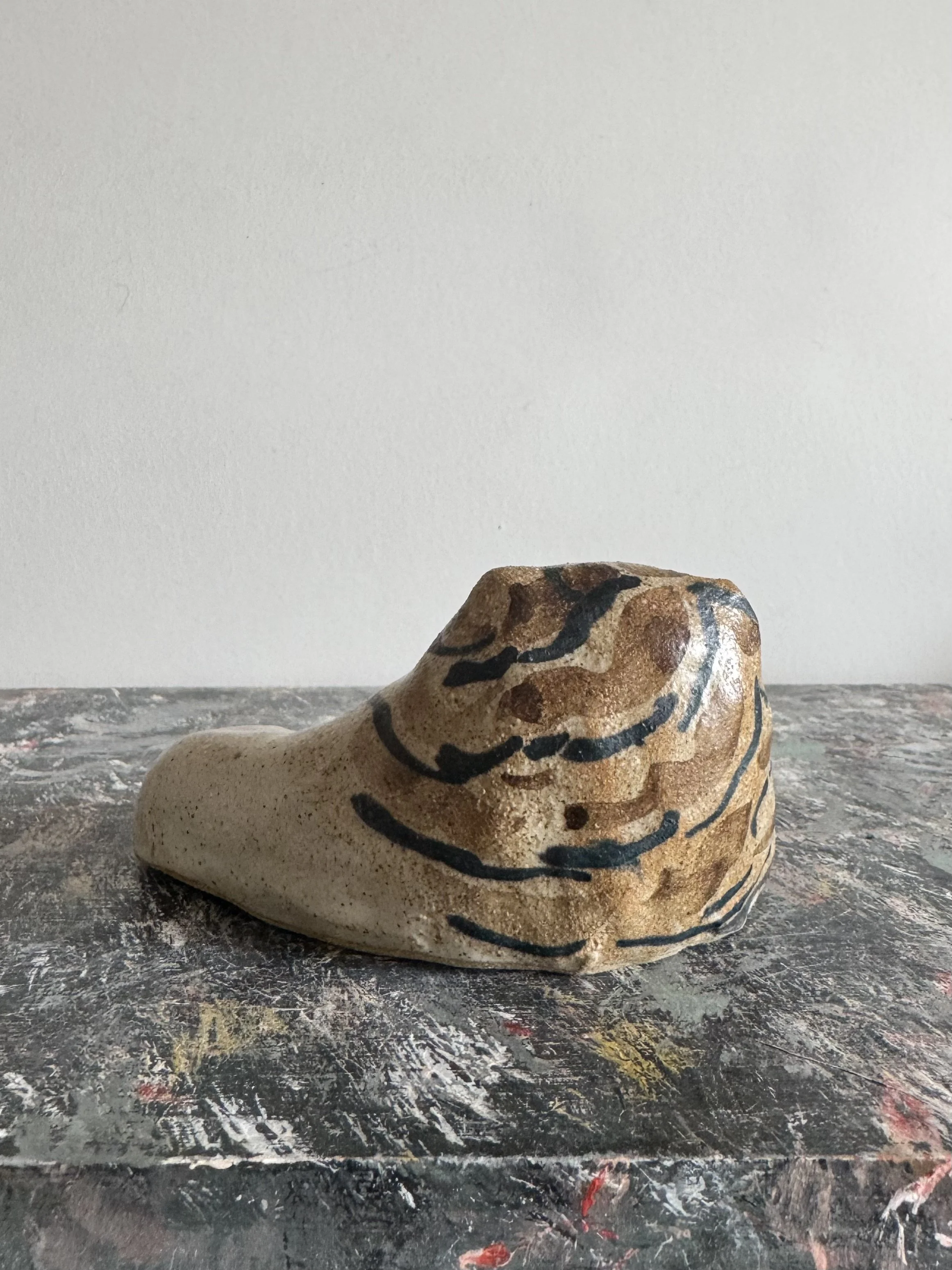 Ceramic Lions by Charlotte Salt
