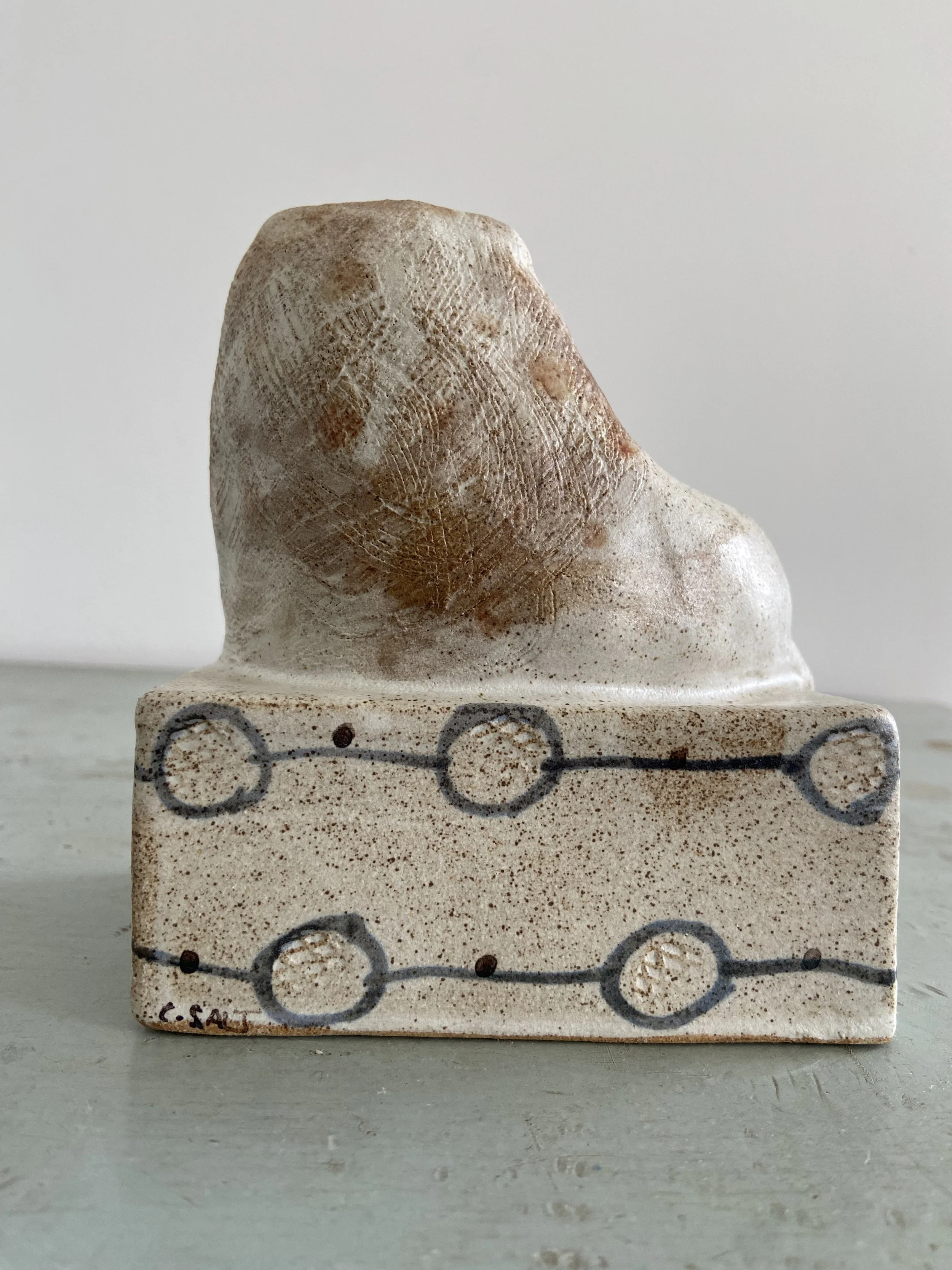 Handmade stoneware lions by Charlotte salt