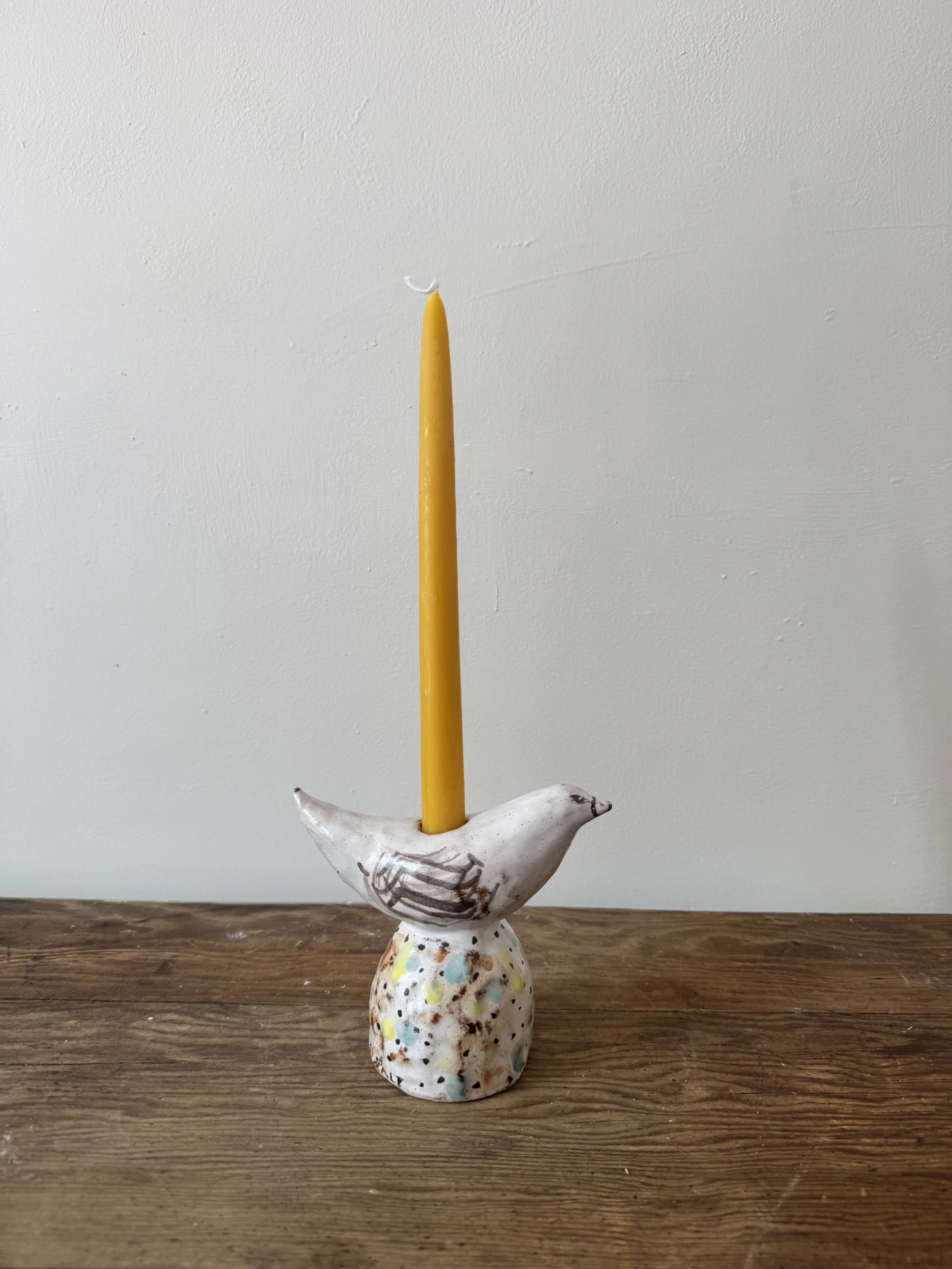 Ceramic bird candleholders by Charlotte Salt