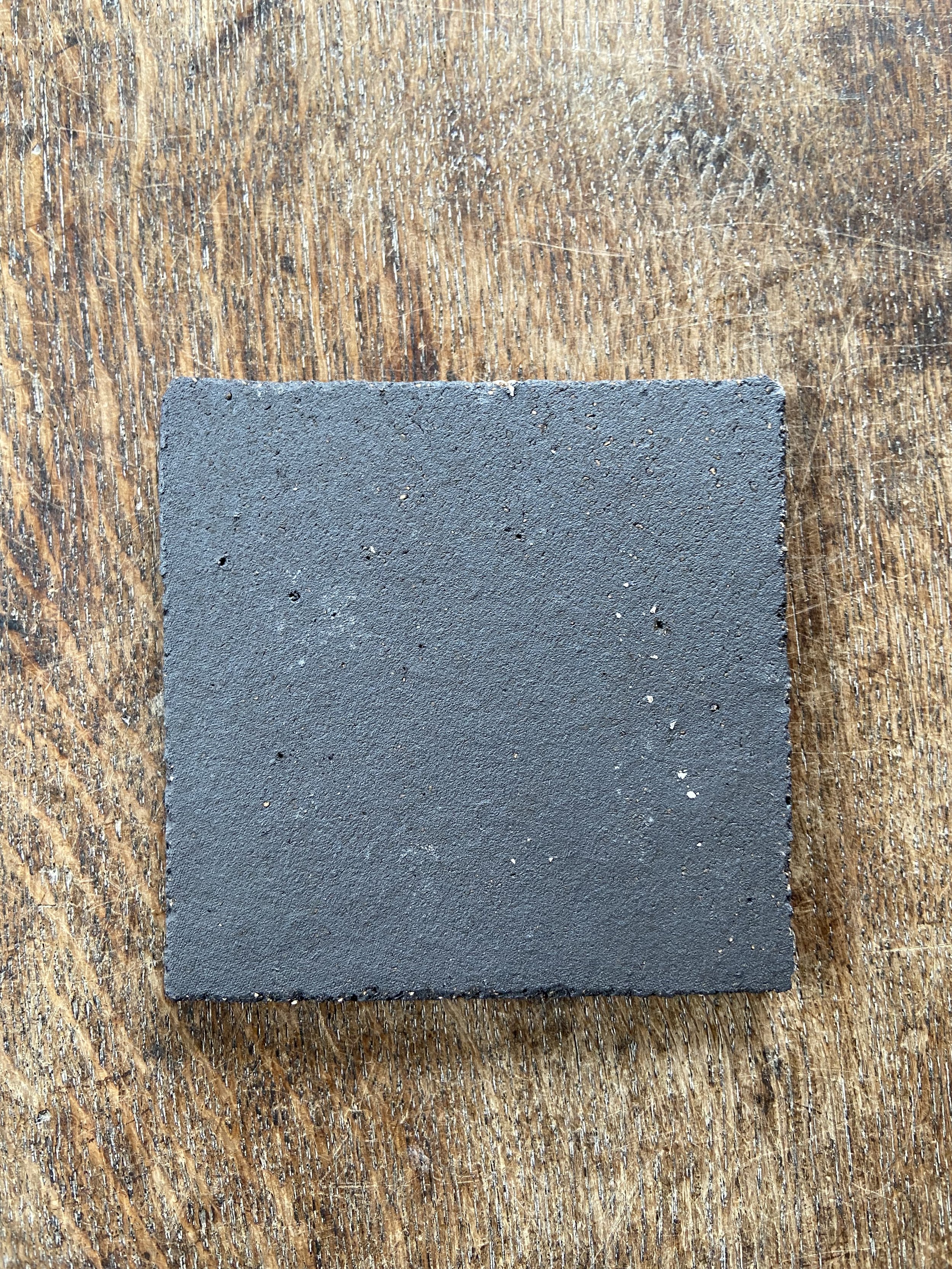 Handmade sun design tile by Charlotte Salt