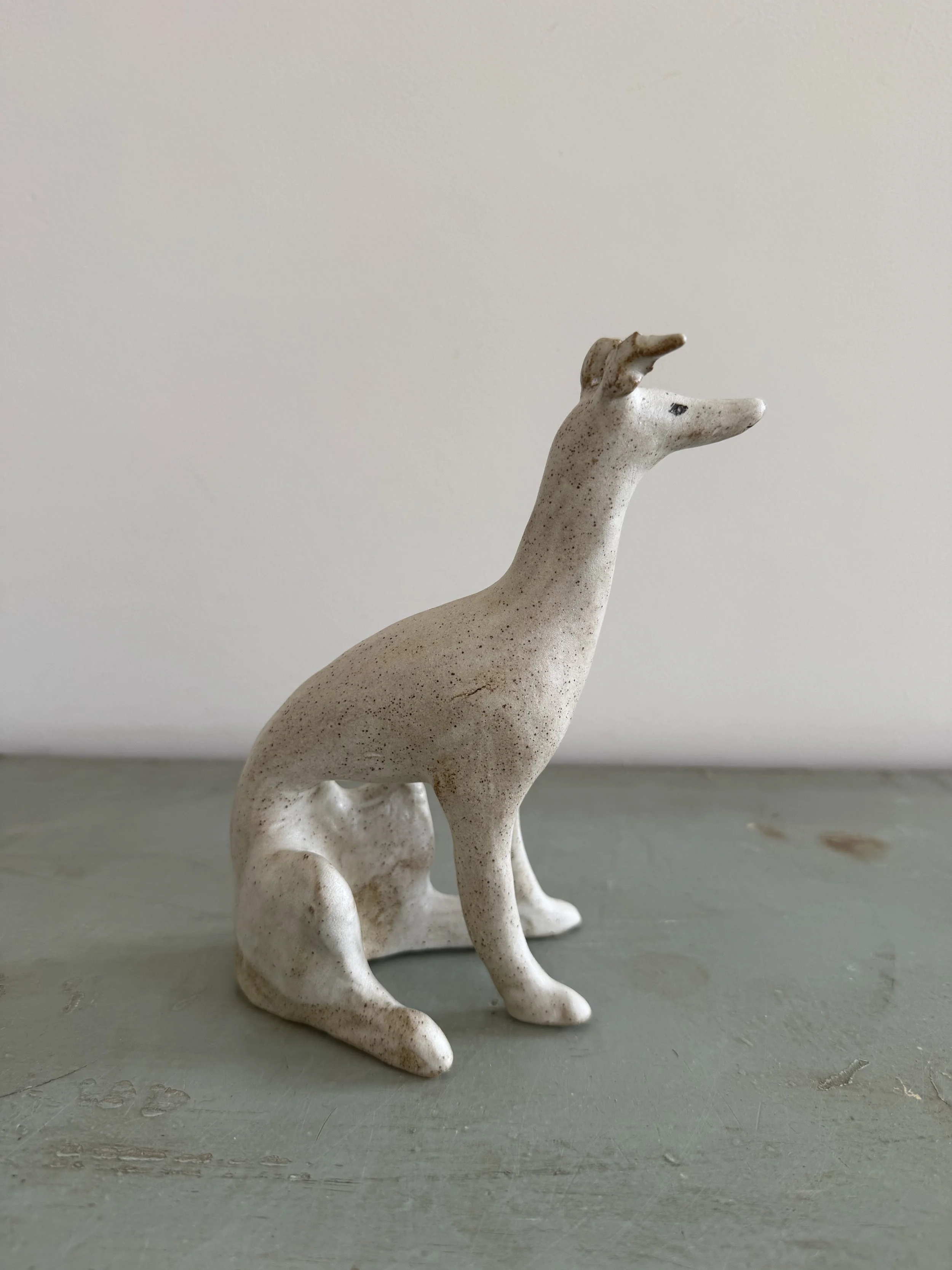 Stoneware hounds by Charlotte Salt