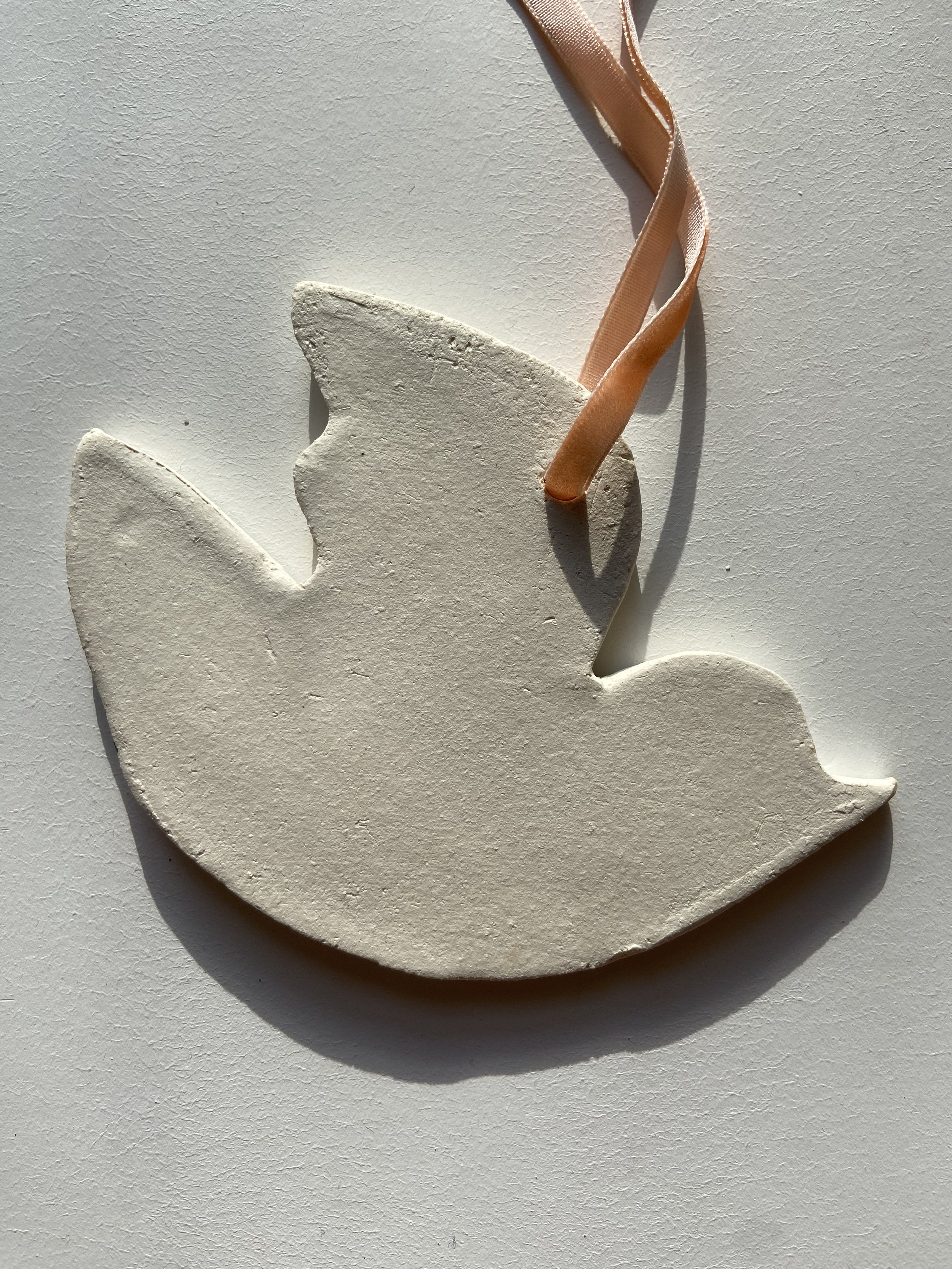 Handmade ceramic decoration by Charlotte Salt