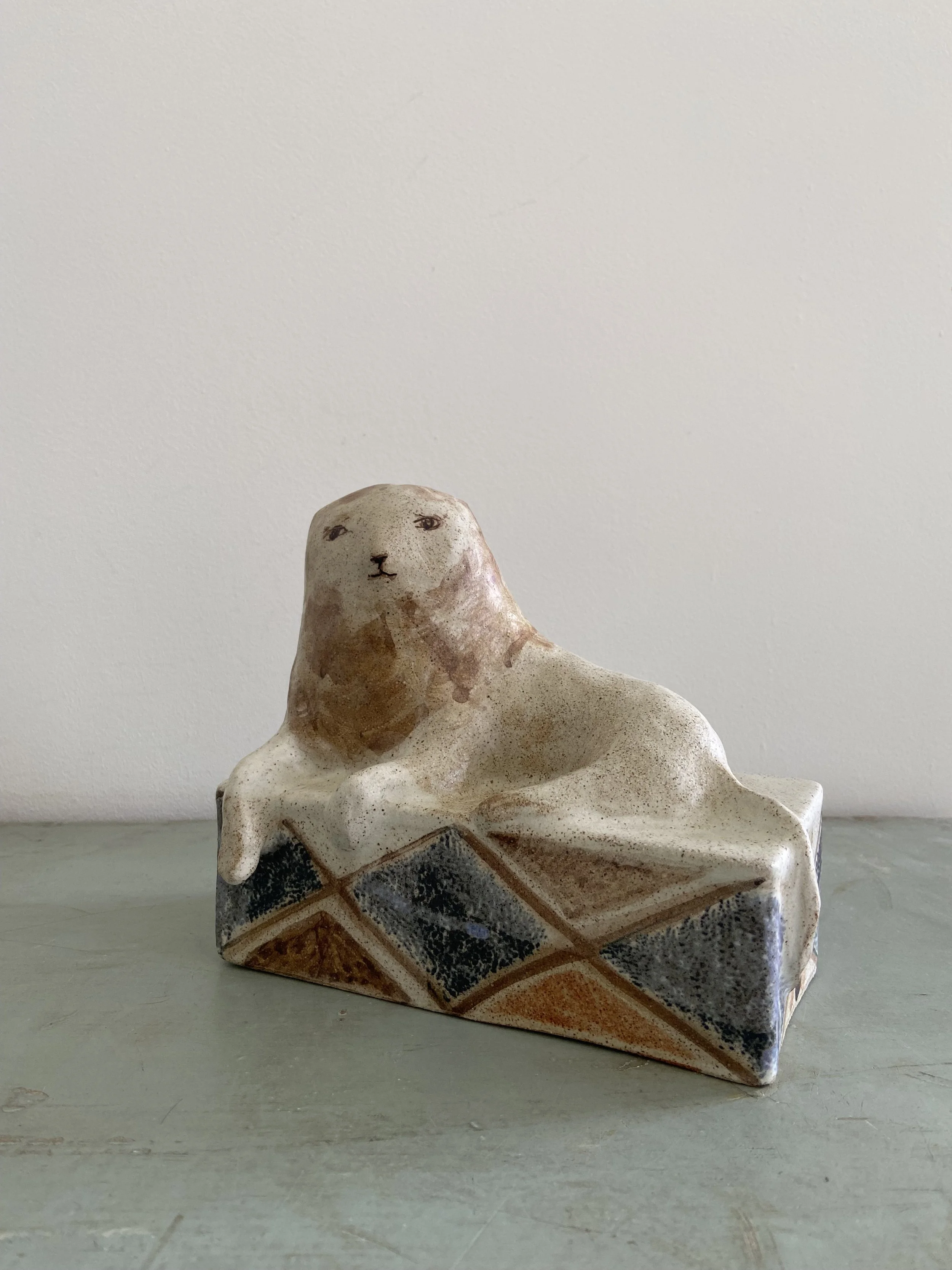 Handmade stoneware lions by Charlotte salt