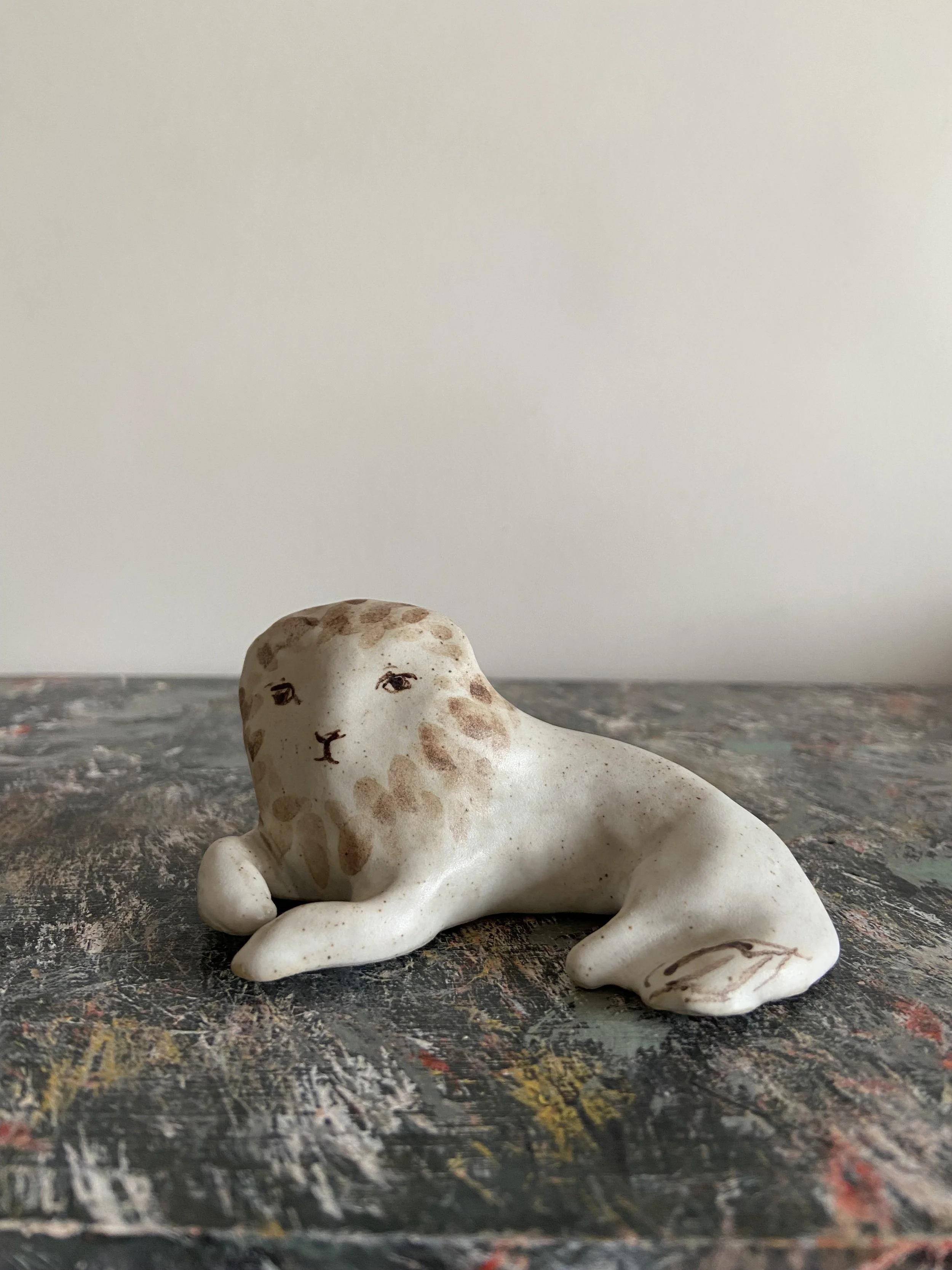 Handmade stoneware lions by Charlotte Salt
