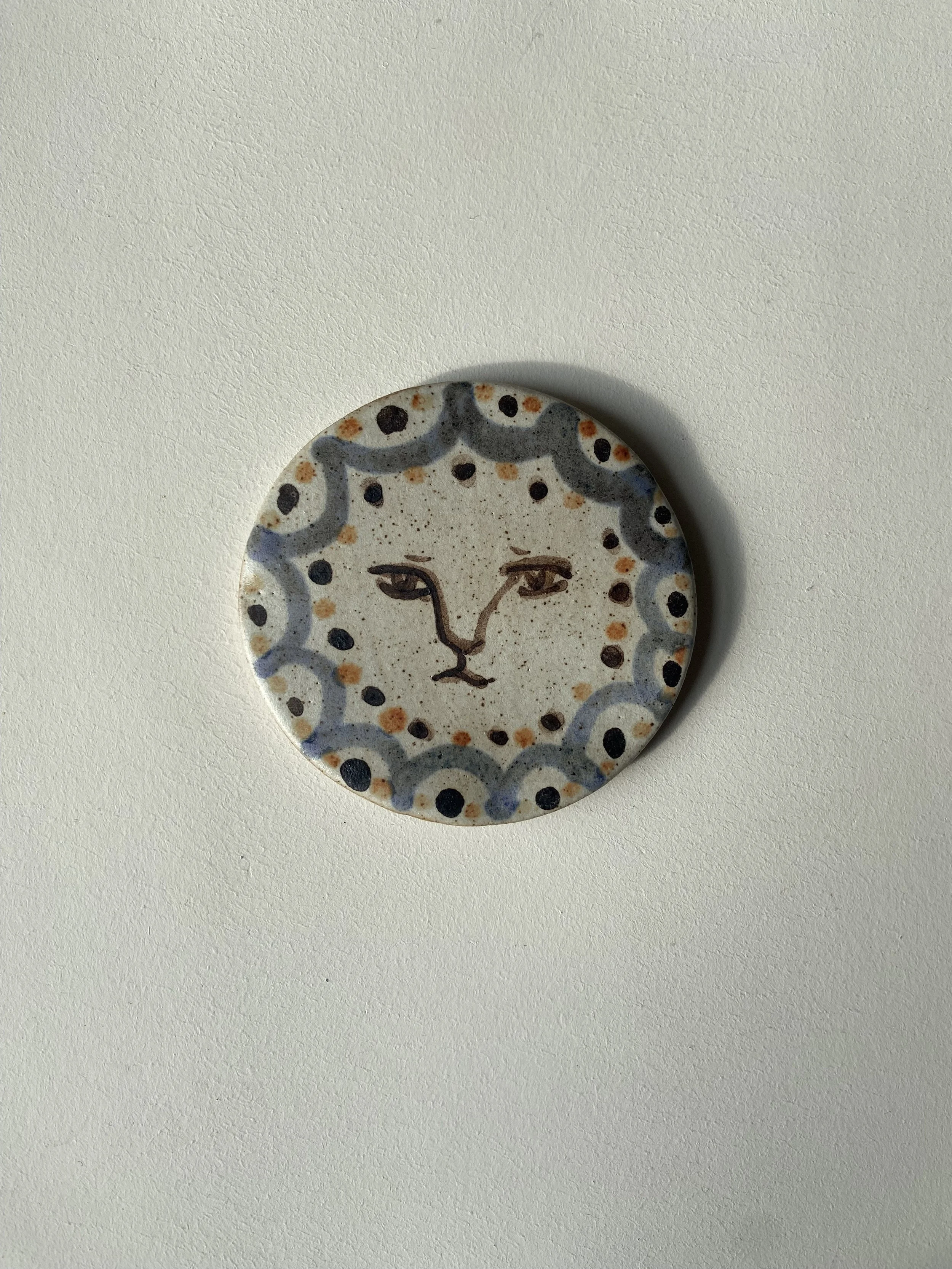 Handmade face disc by Charlotte Salt