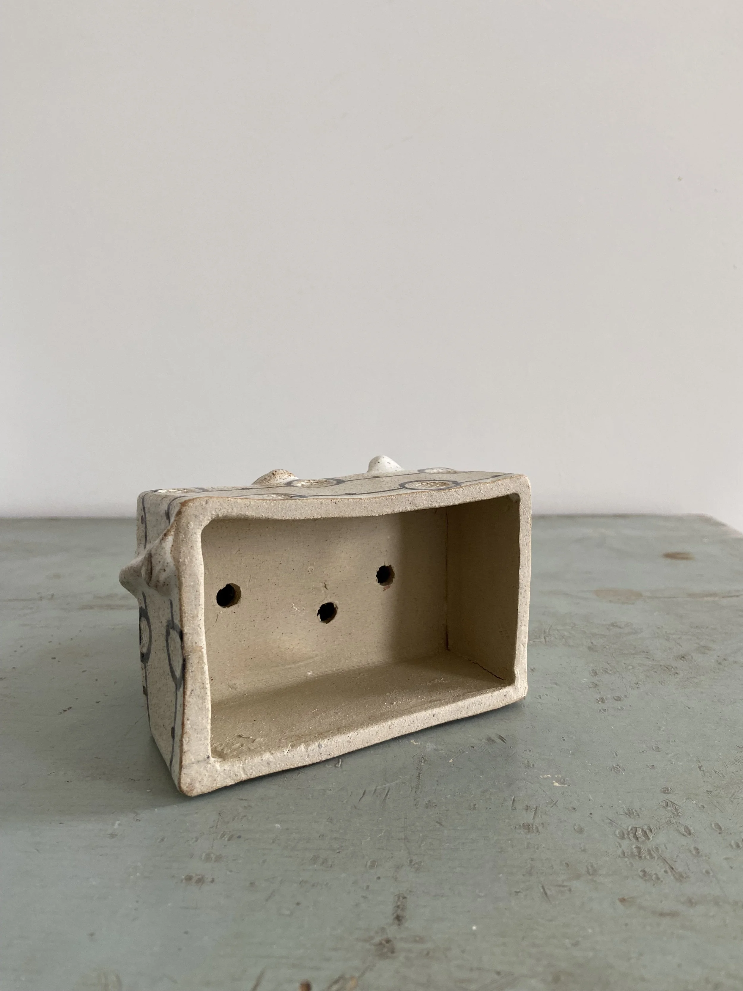Handmade stoneware lions by Charlotte salt