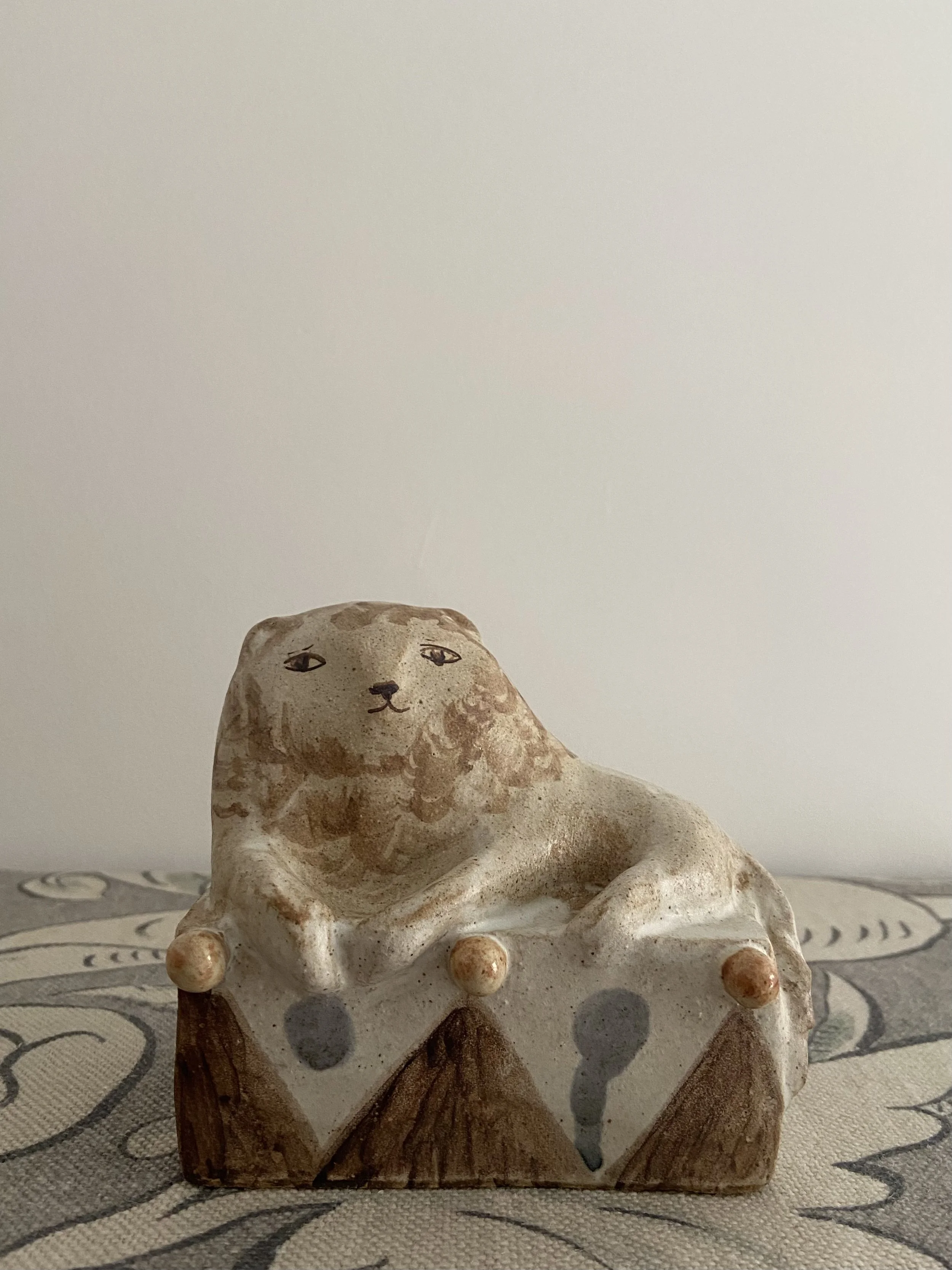 Stoneware lions by Charlotte Salt