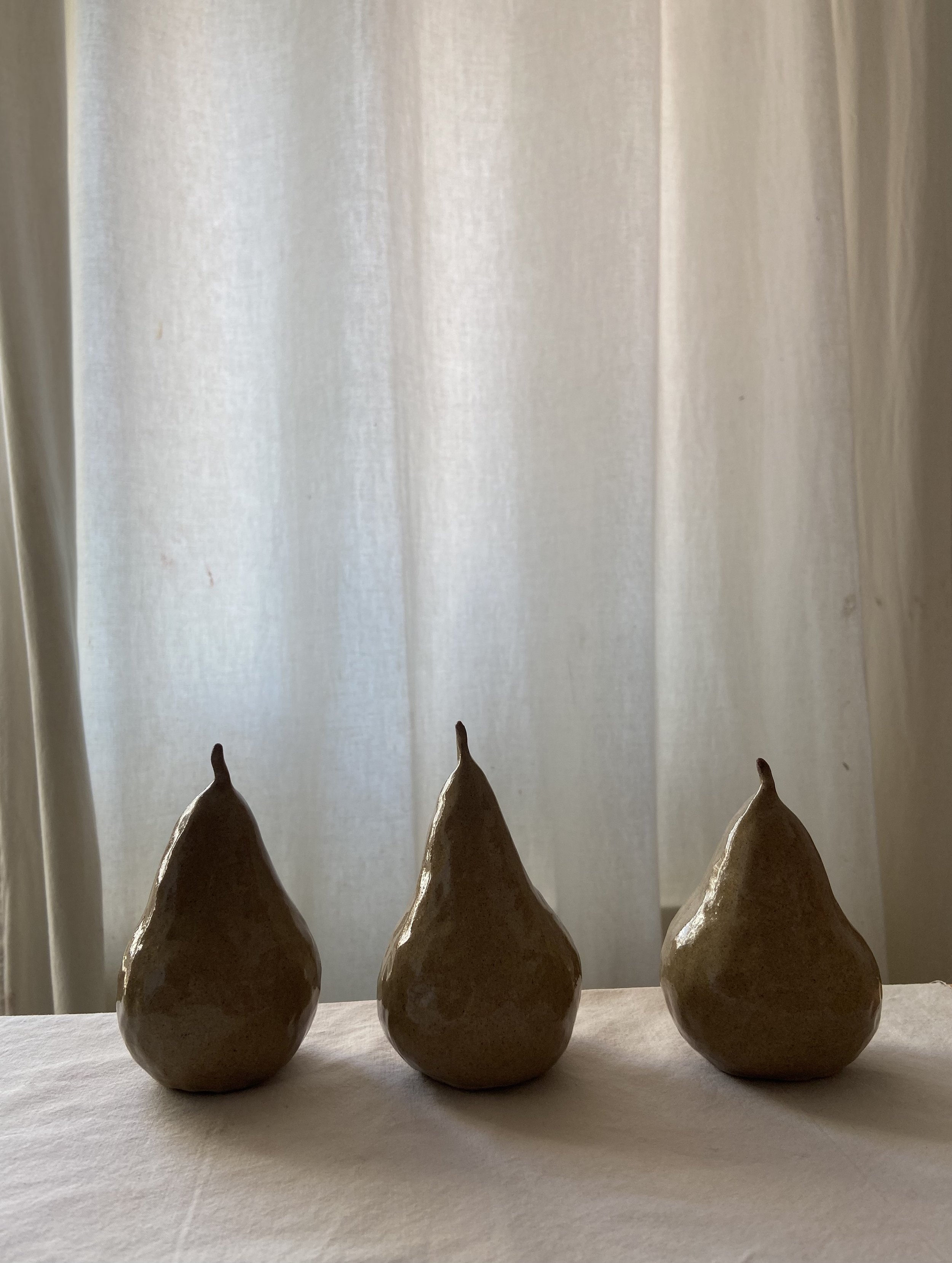 Ceramic pinched pears by Charlotte Salt