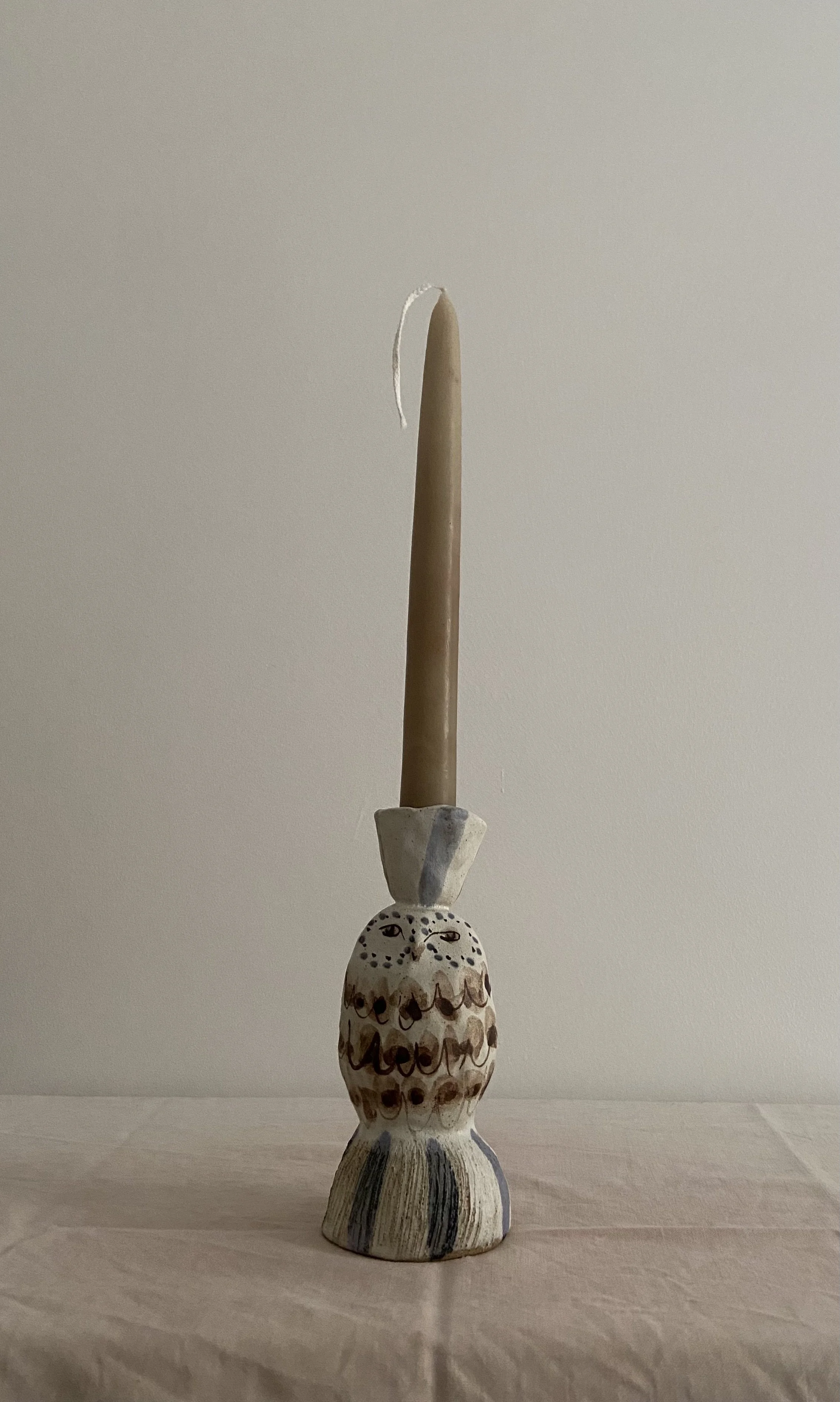 Ceramic owl candleholders by Charlotte Salt