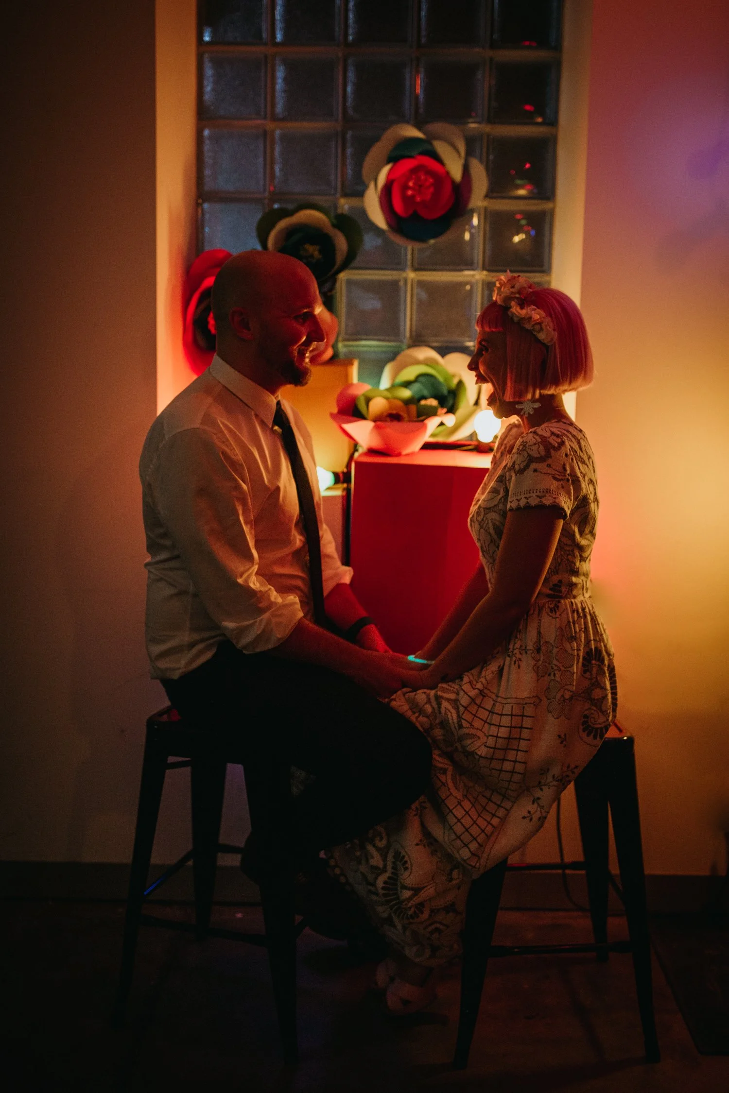 Moody but fun wedding portrait of alternative couple