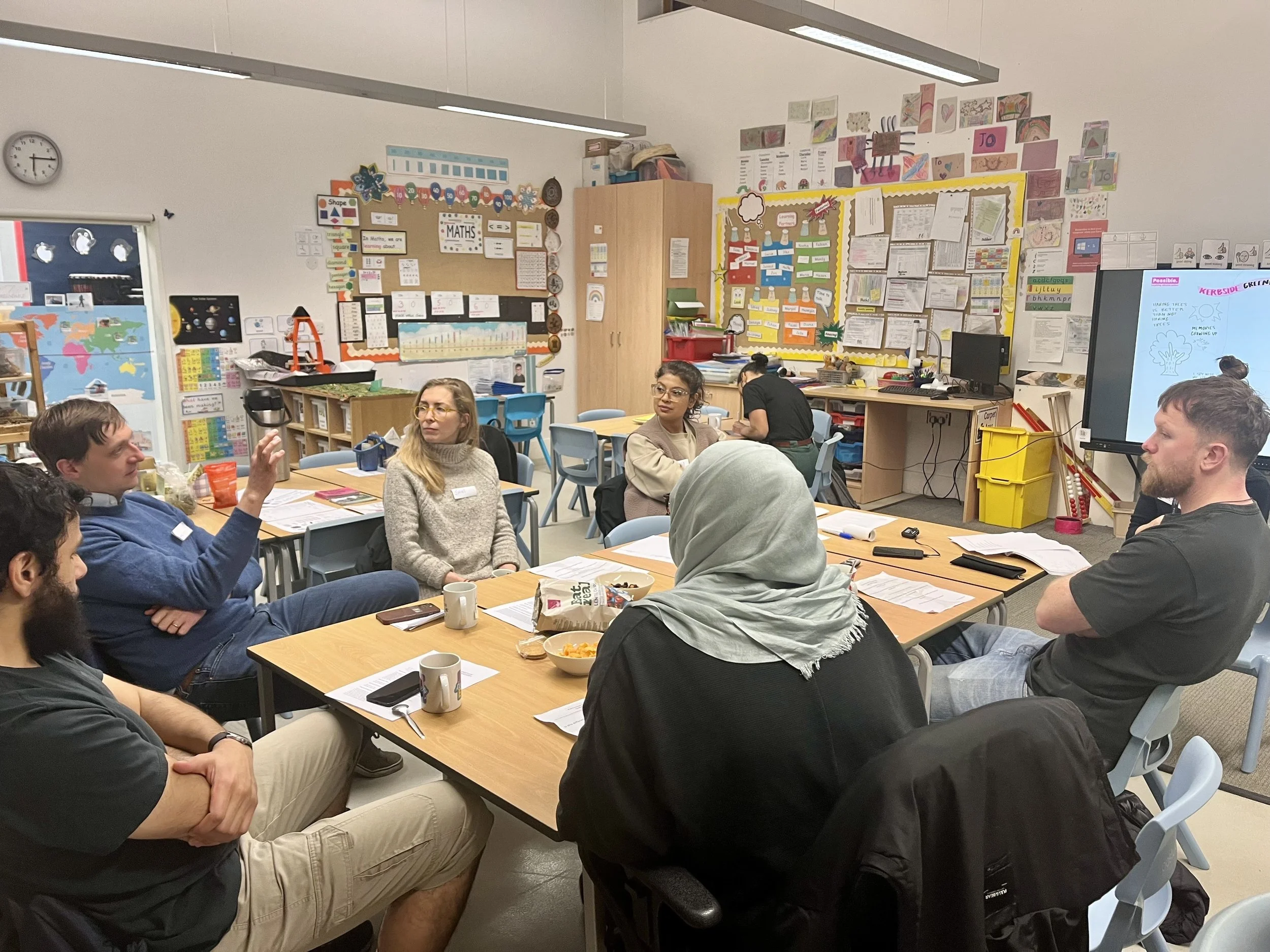 Photo of Sebert Road residents discussing the future of their street during one of our research workshops.