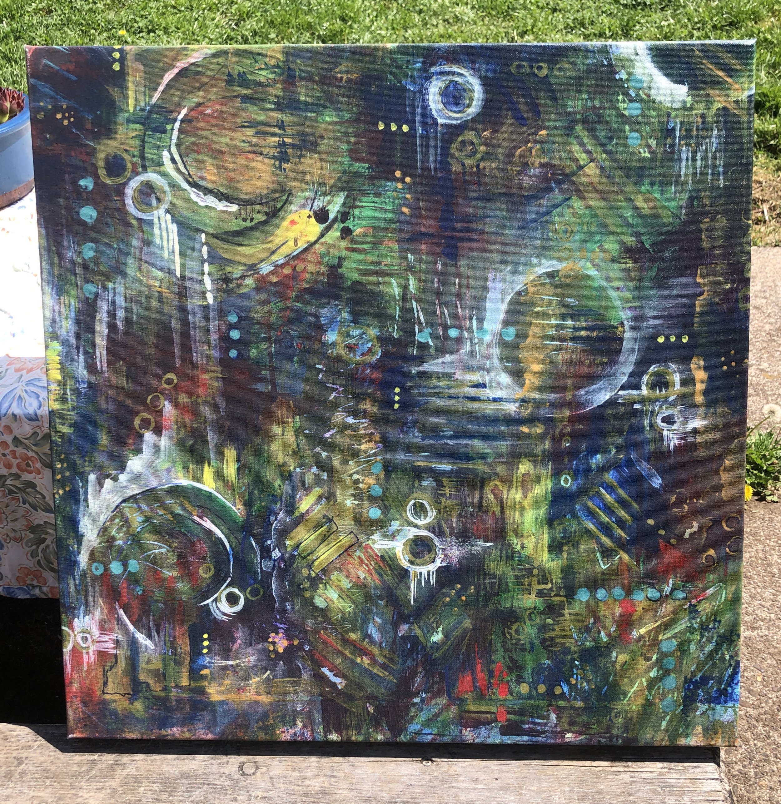“Angels and Ancestors” 13” x 13” is an original mixed-media abstract painting on photographic paper, combining spray paint, and acrylics.
