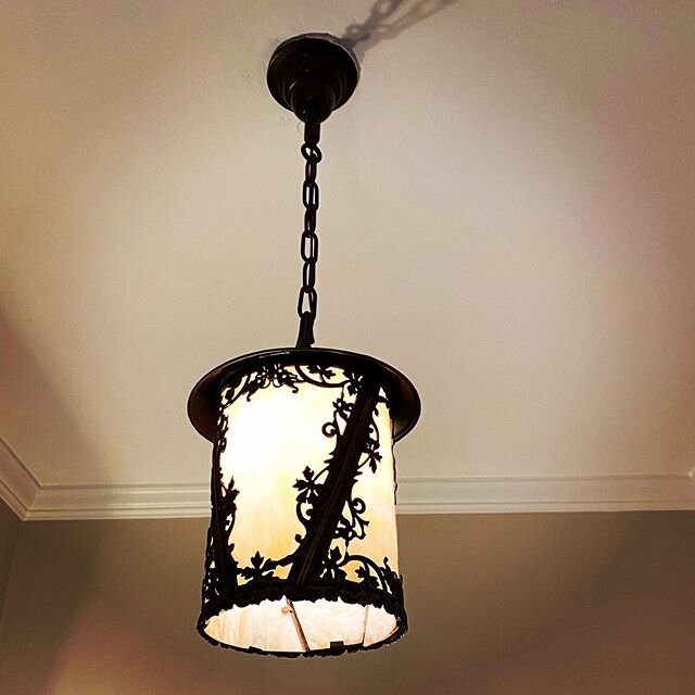 Interesting and #intricate #pendant #vintagelighting in this #prewar #coop. Look at the 😀#butterfly detail in the second photo. Also, the interior construction is fascinating. It&rsquo;s #handmade and #beautful. #bestaddress #rlah #historichomes