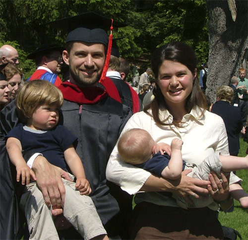 Bryan at Seminary graduation with his wife and children.