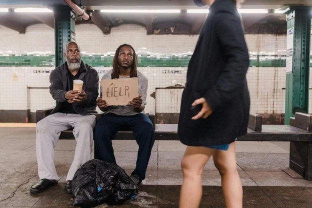 Person holding help sign