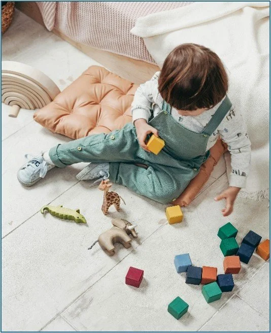 Kid playing with toys