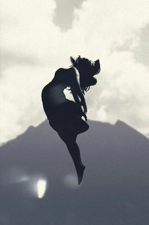 Shadow of a woman jumping