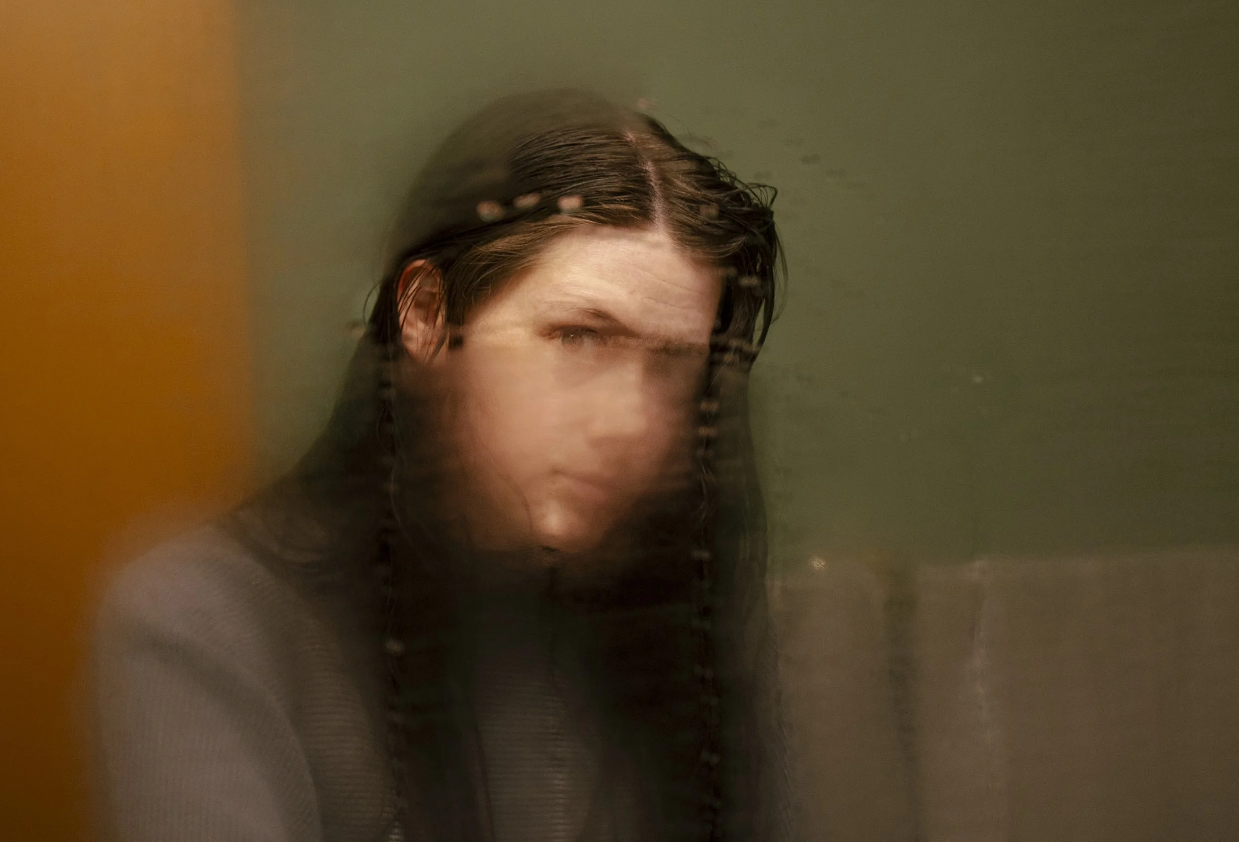  My partner glances at me during an unexpected portrait while we’re getting ready for the day. During grad school, this short morning routine will be the only time we get to be with each other some days.  