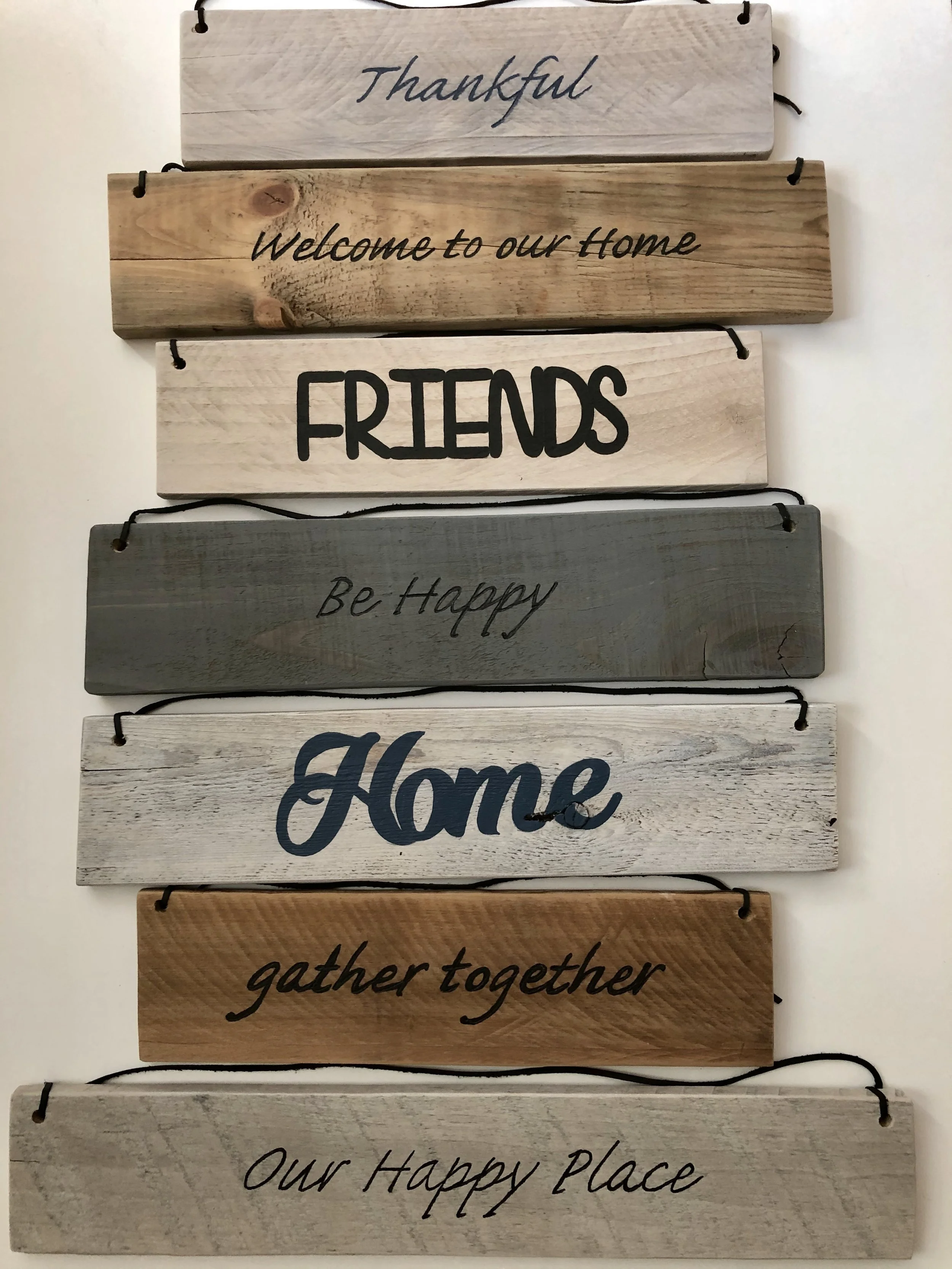 Hand painted wood signs.