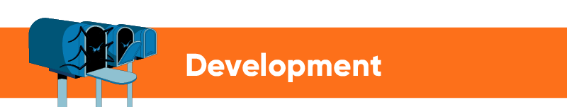 Two blue mailing boxes with open lids with a spider creature crawling out on an orange banner sign that says "Development".