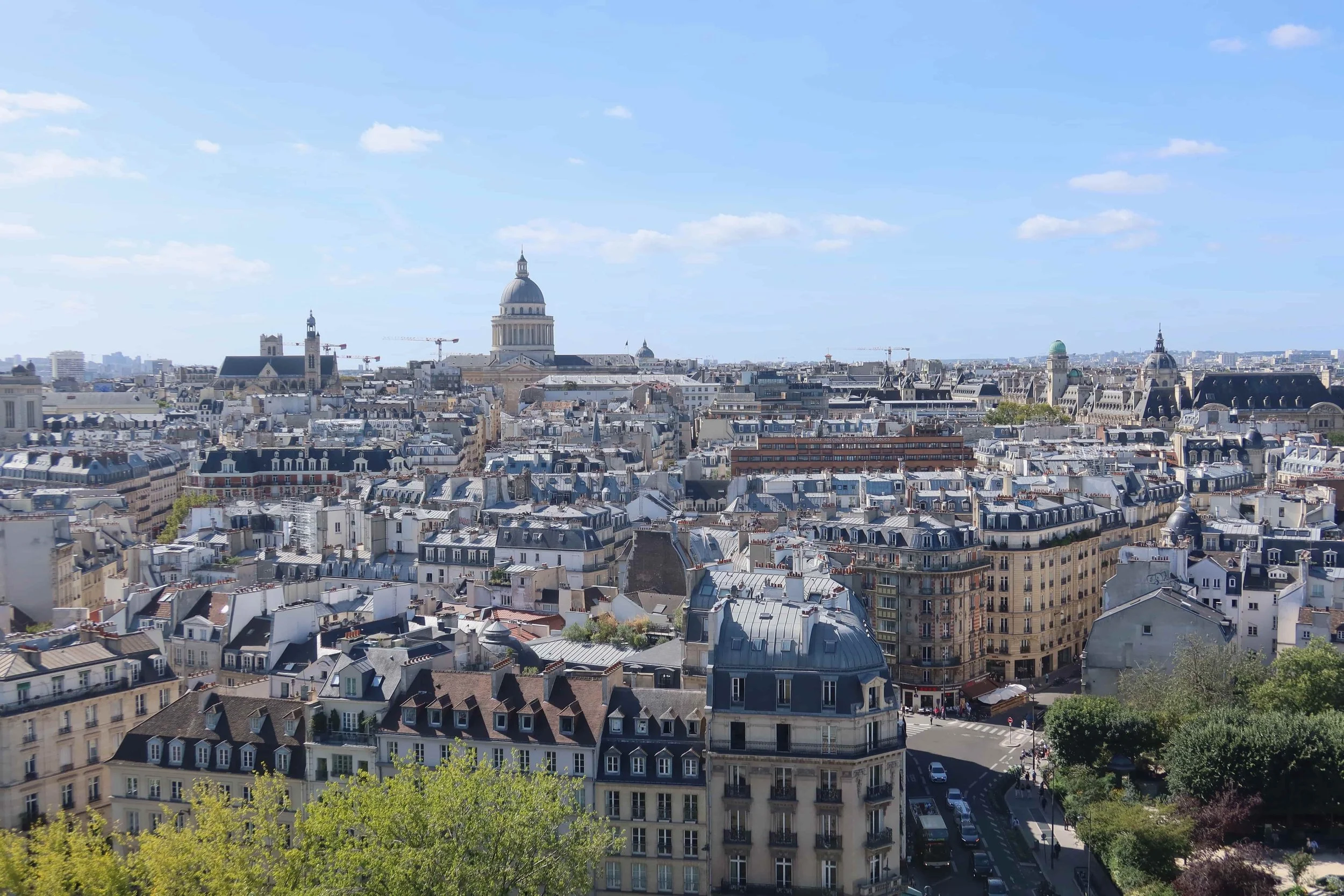 view of pantheon in paris and parisian rooftops