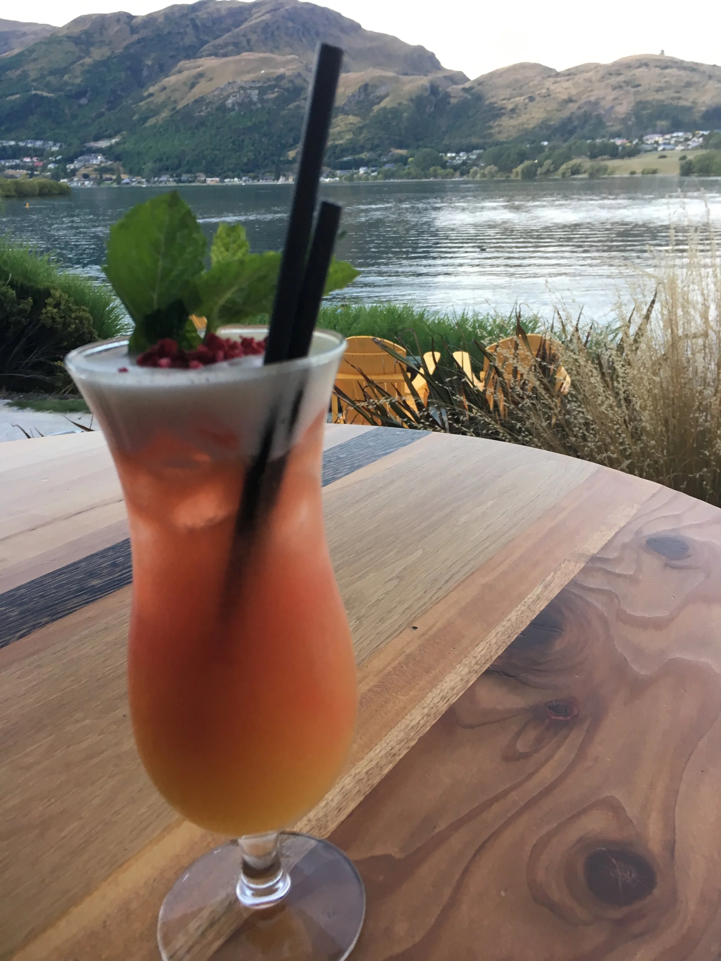 Enjoying a “mocktail” while overlooking the mountains of Queenstown; January 2019