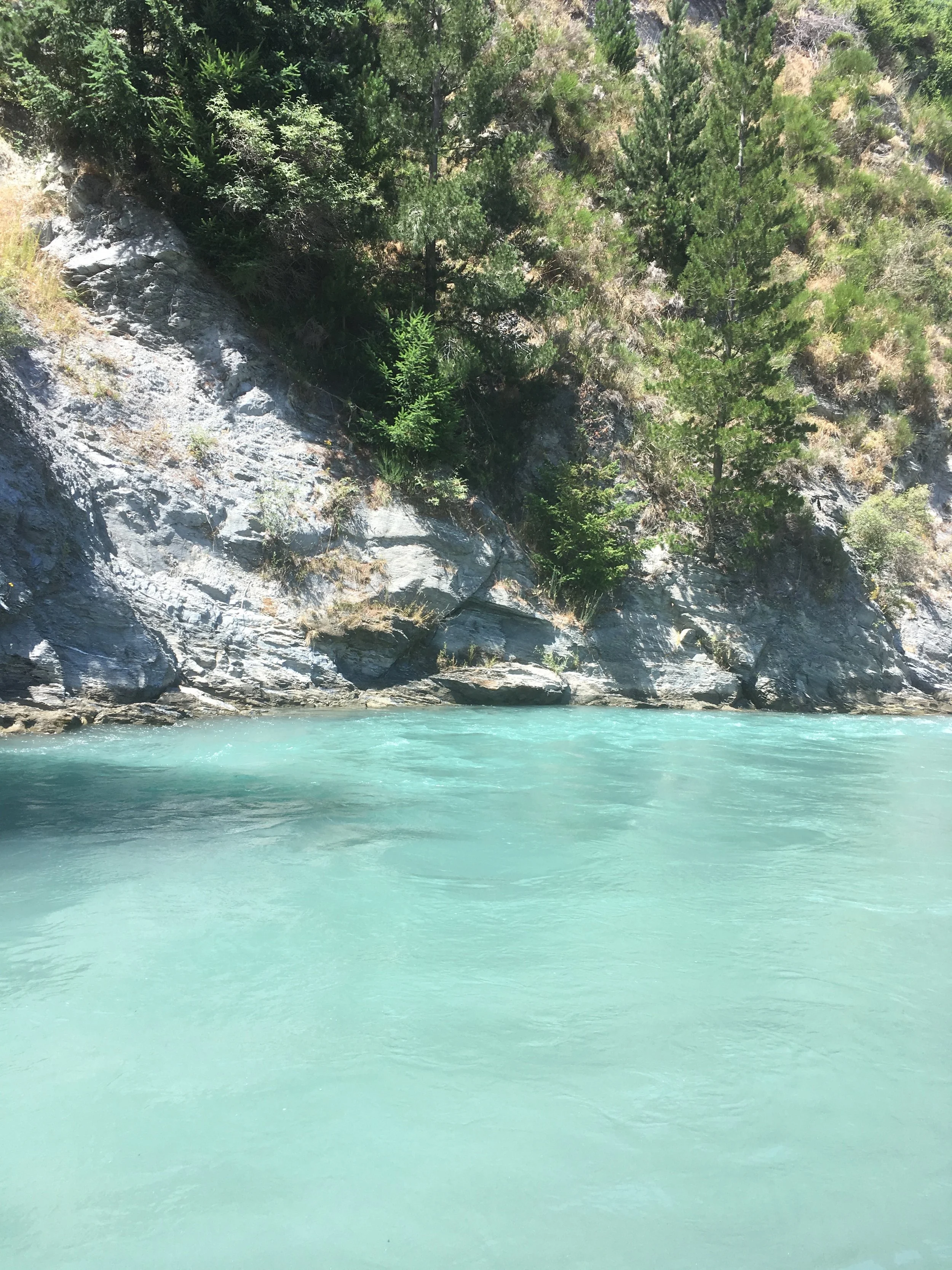 teal water on the shotover river in Queenstown