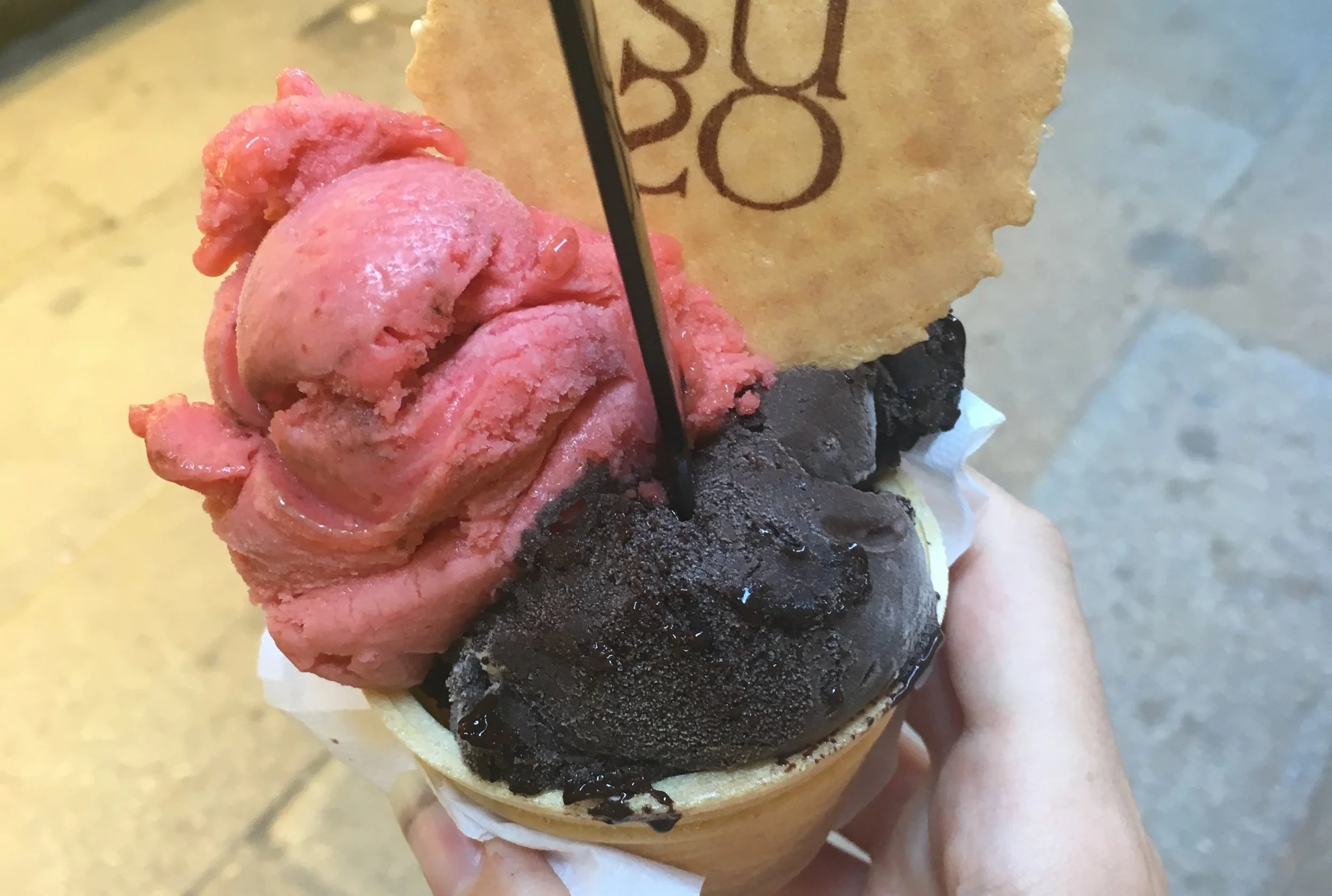 strawberry chocolate gelato with wafer cookie