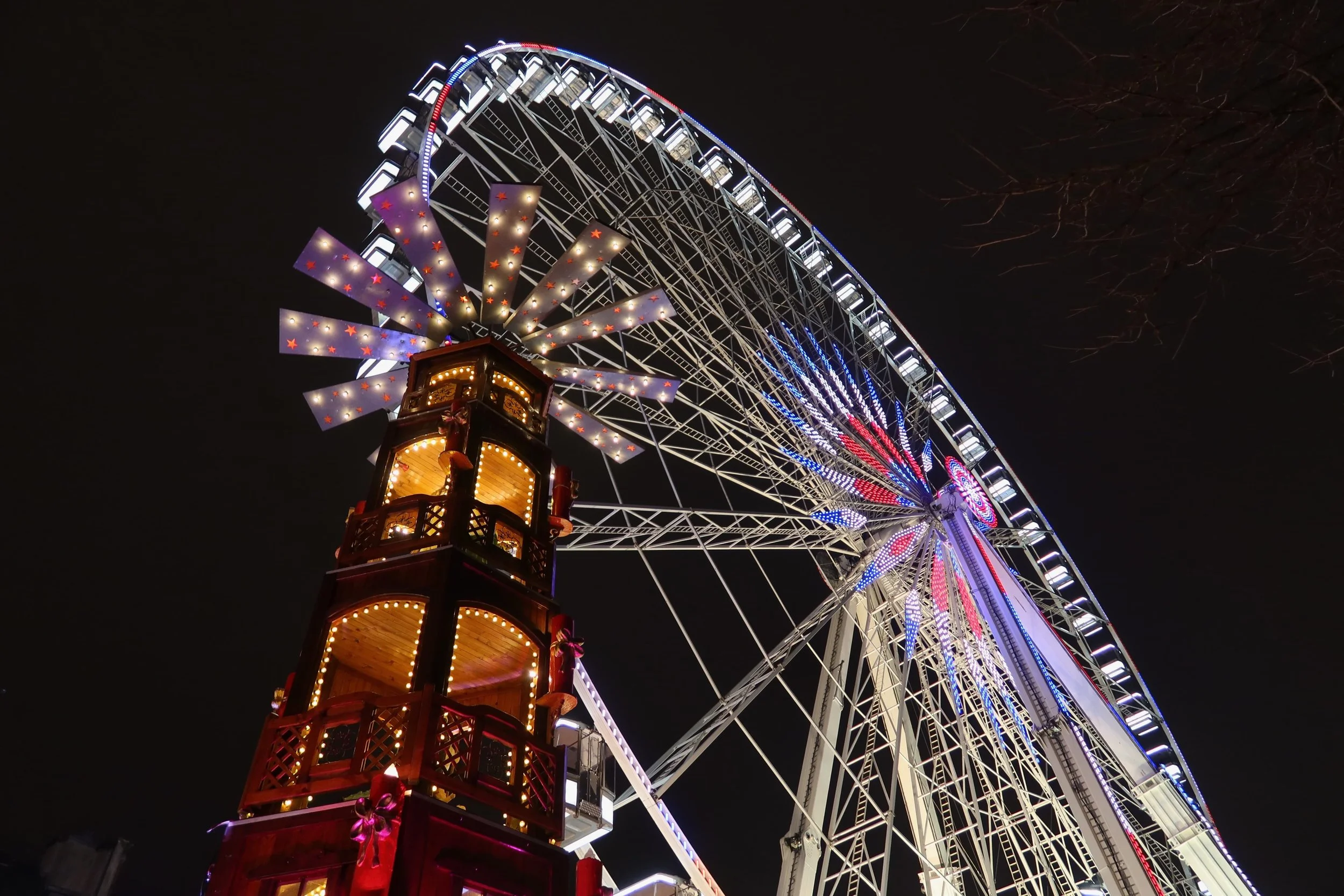 parris ferris wheel at night during christmas in fetes des tuileries