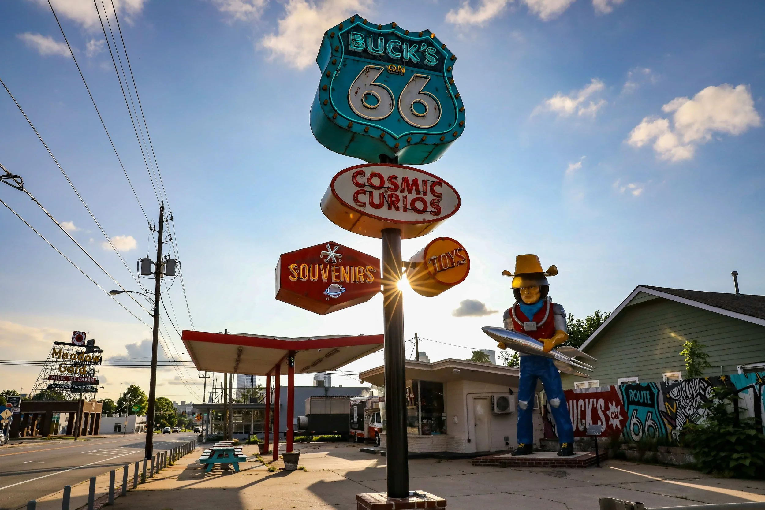 route 66 sign and little stops and shops