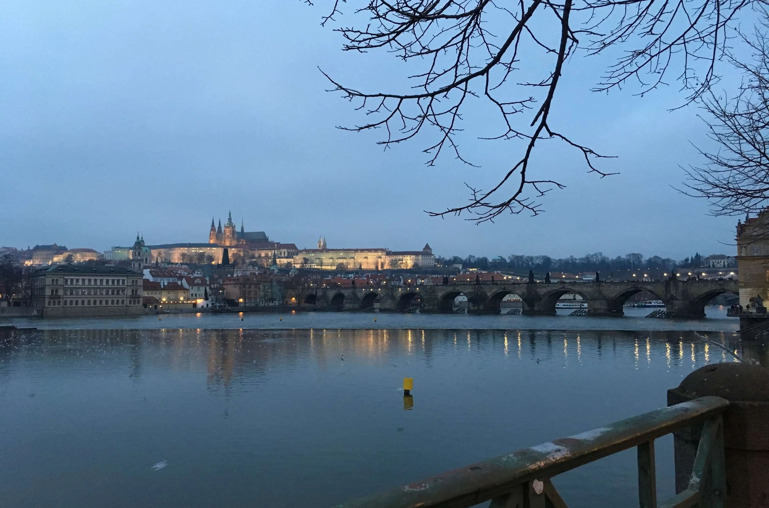 castle on the water at dusk