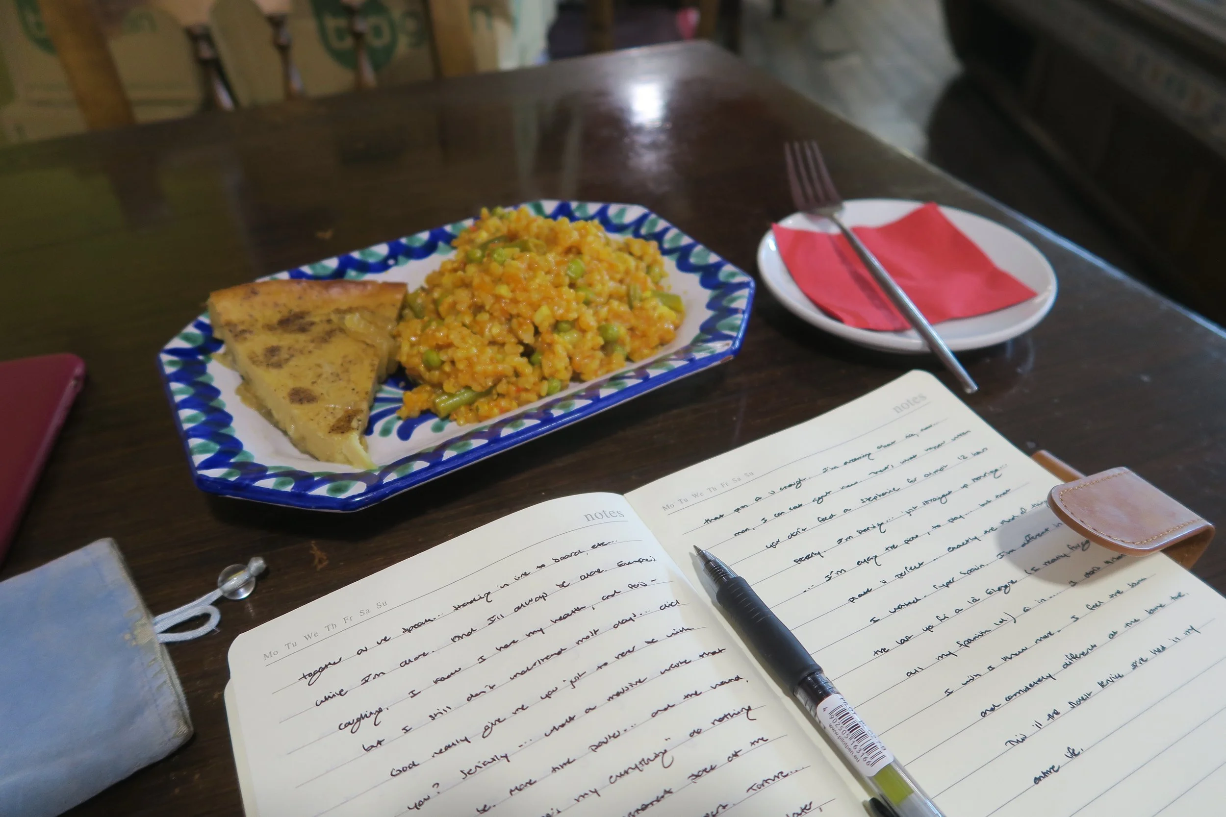 journal with pen and rice and quice