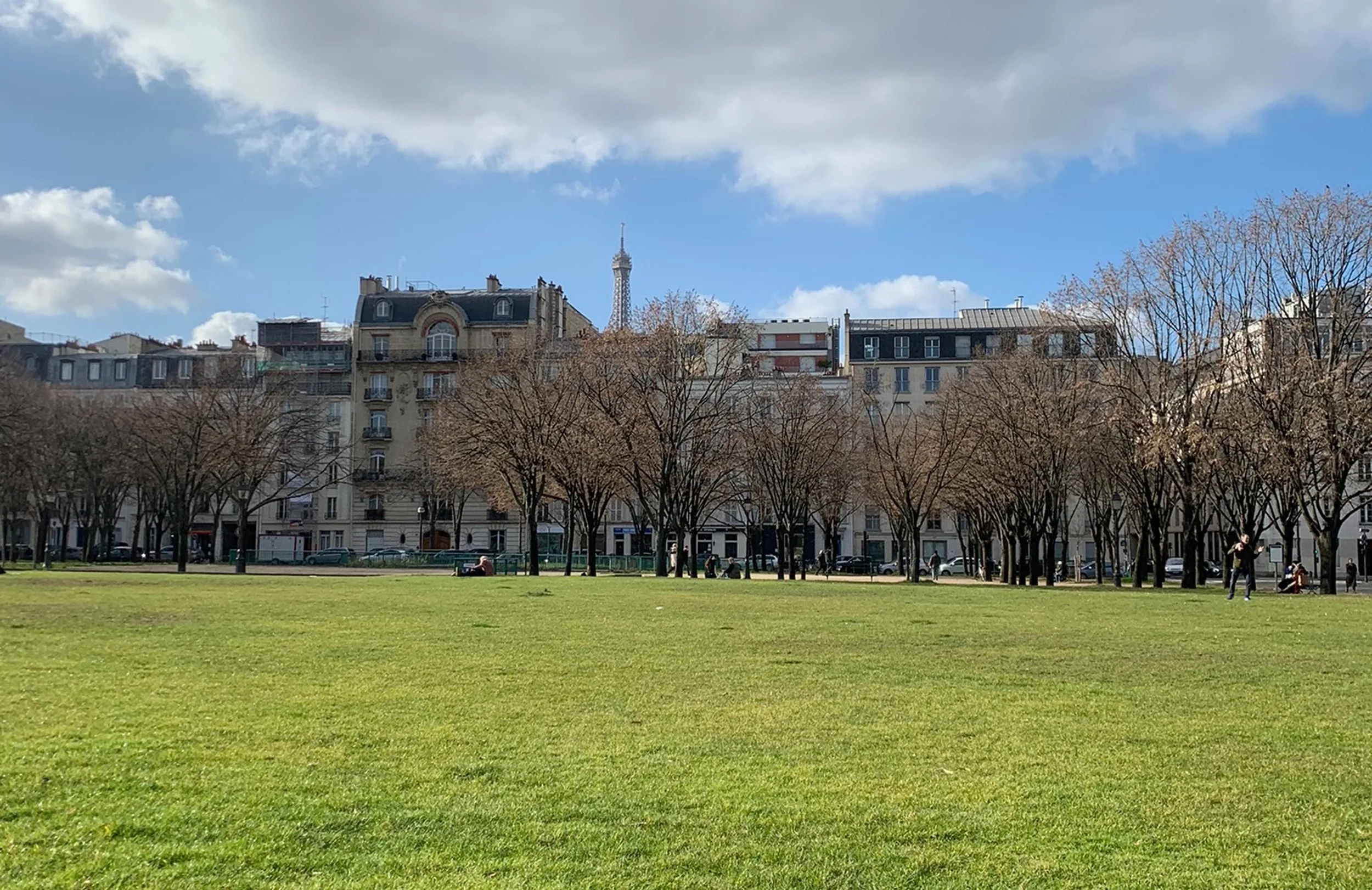 eiffel tower view from invalides bright green lawn