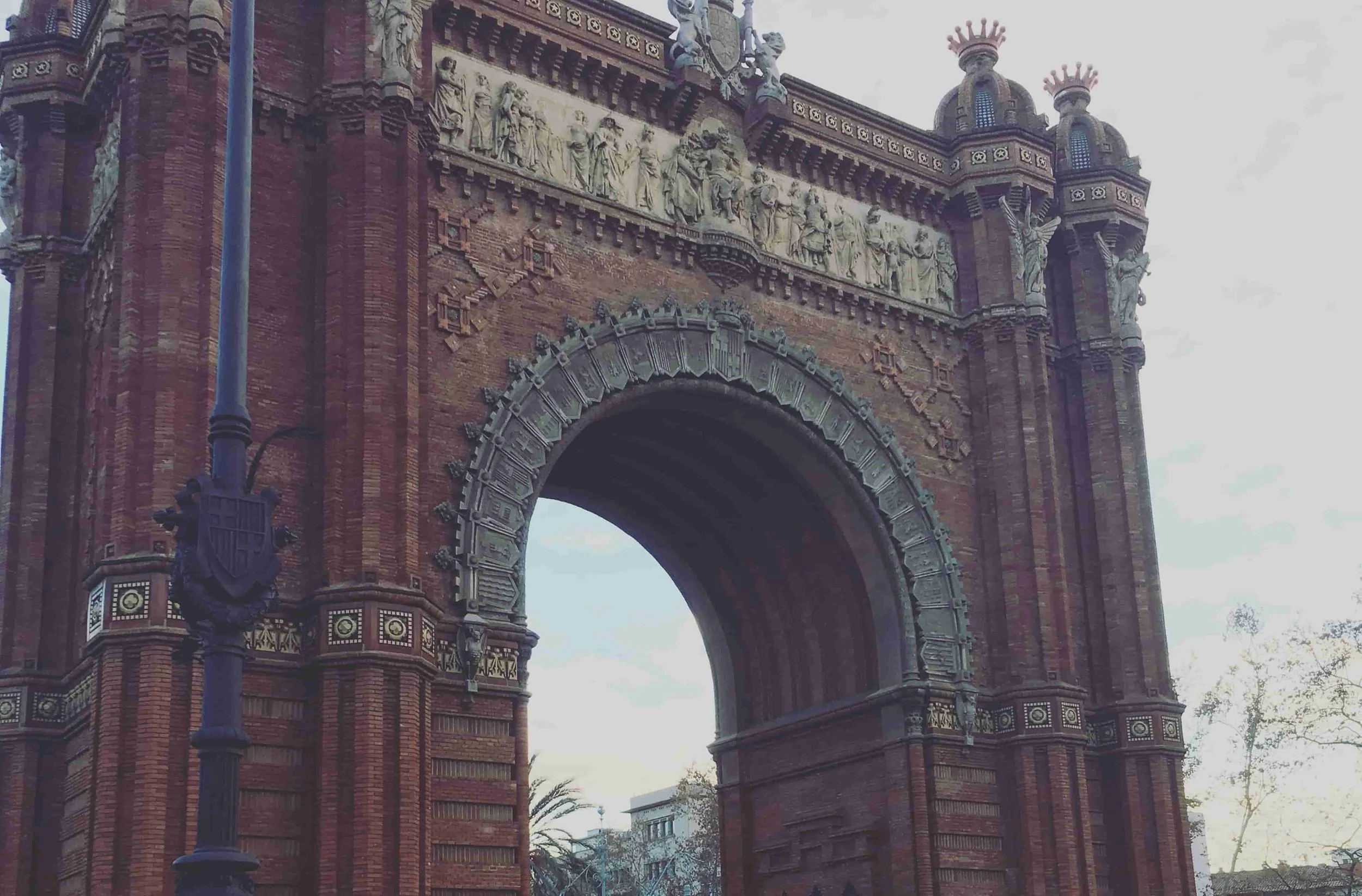 red rustic arc with intricate detailing